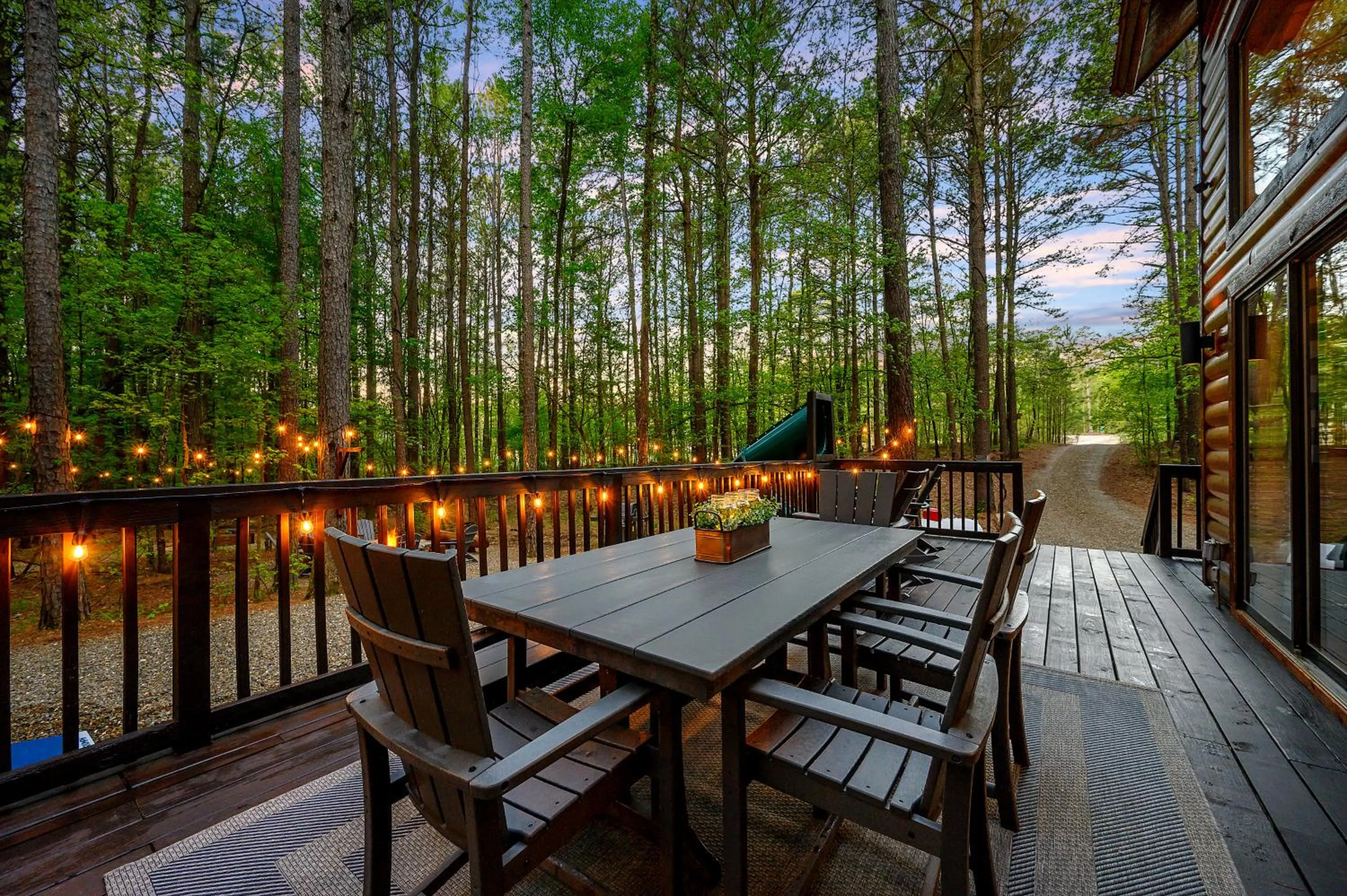 Balcony/Terrace in Hickory Bear - Cabin surrounded by pines, Sleeps 10, Hot Tub, Fire Pit, Arcade, Foosball Table & Deck Slide