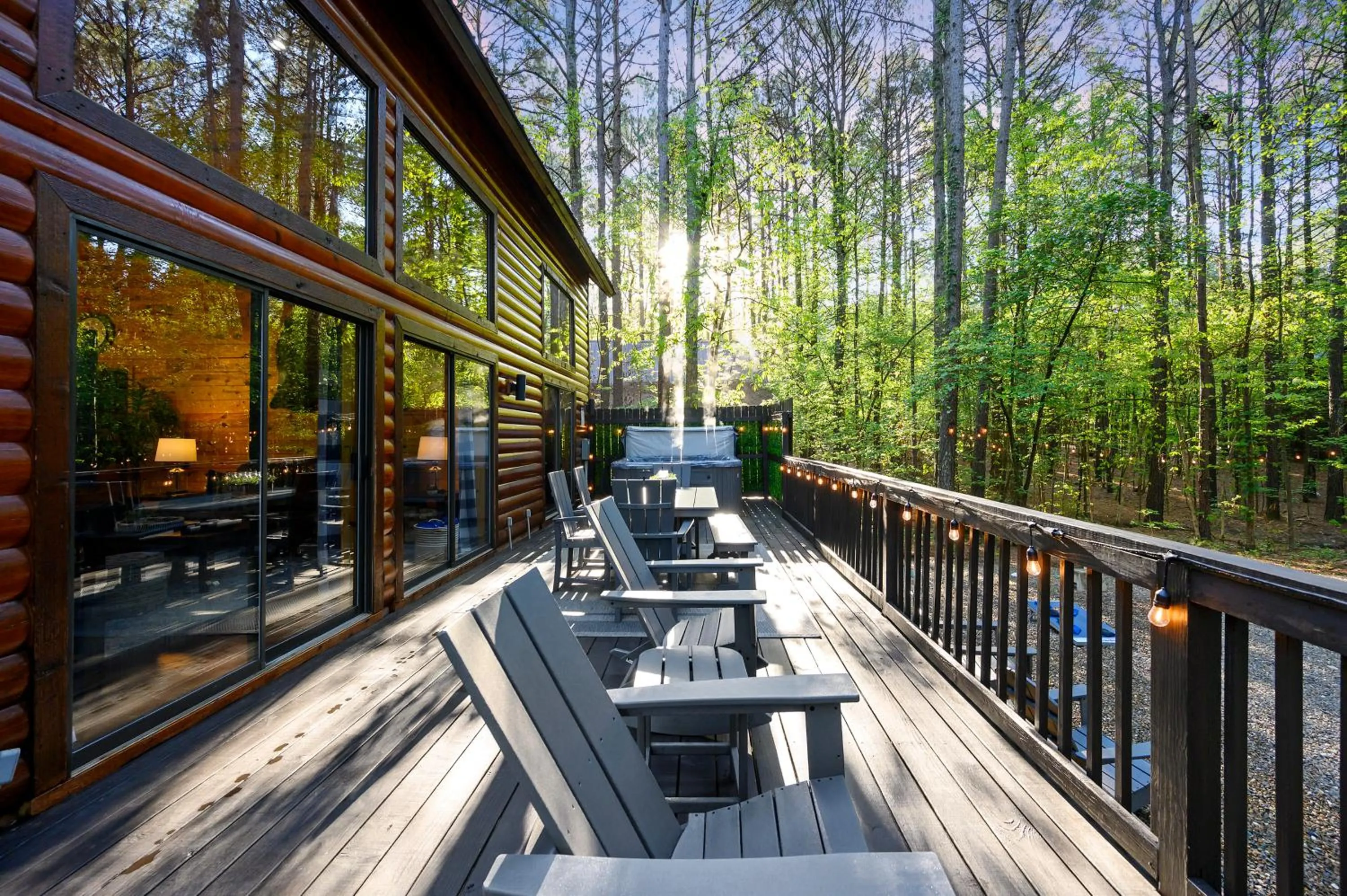 Balcony/Terrace in Hickory Bear - Cabin surrounded by pines, Sleeps 10, Hot Tub, Fire Pit, Arcade, Foosball Table & Deck Slide