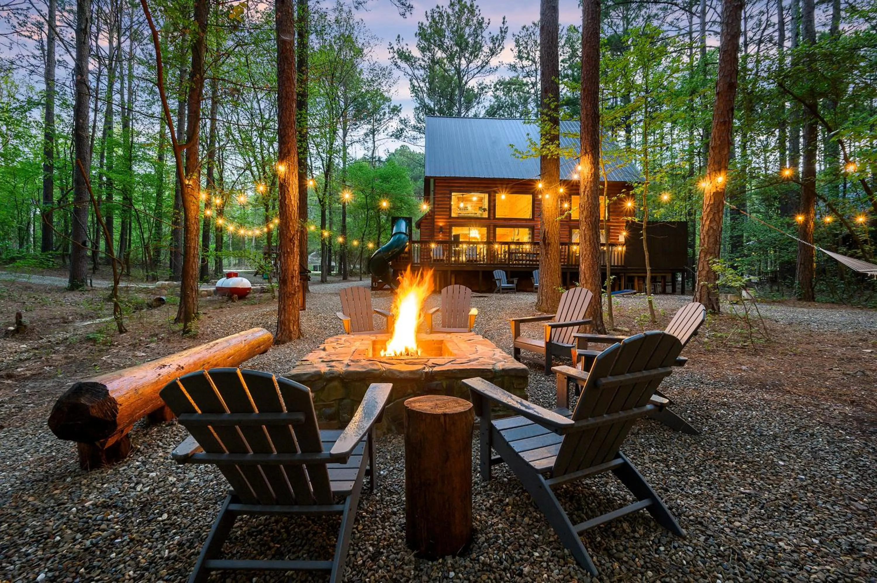 Evening entertainment in Hickory Bear - Cabin surrounded by pines, Sleeps 10, Hot Tub, Fire Pit, Arcade, Foosball Table & Deck Slide