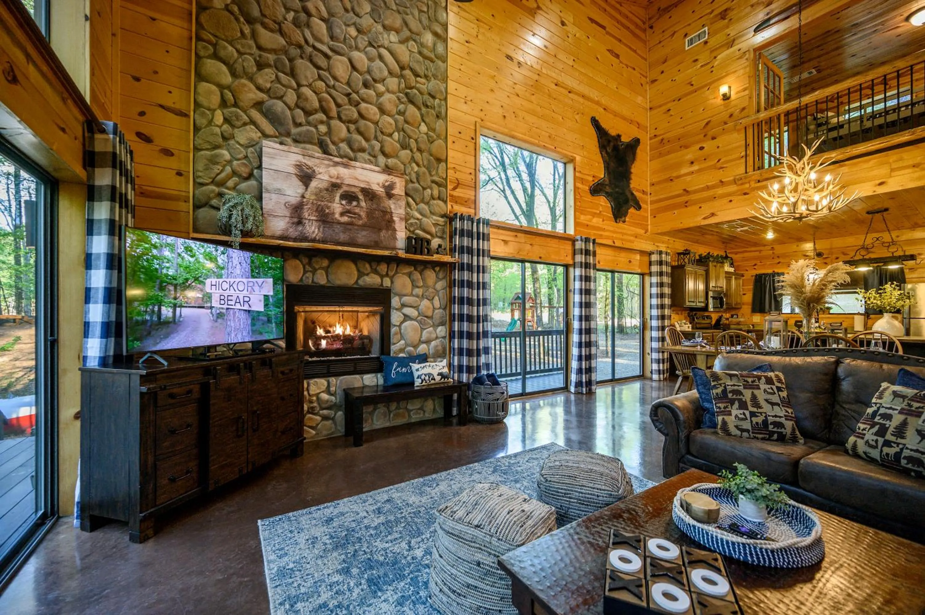 TV and multimedia in Hickory Bear - Cabin surrounded by pines, Sleeps 10, Hot Tub, Fire Pit, Arcade, Foosball Table & Deck Slide