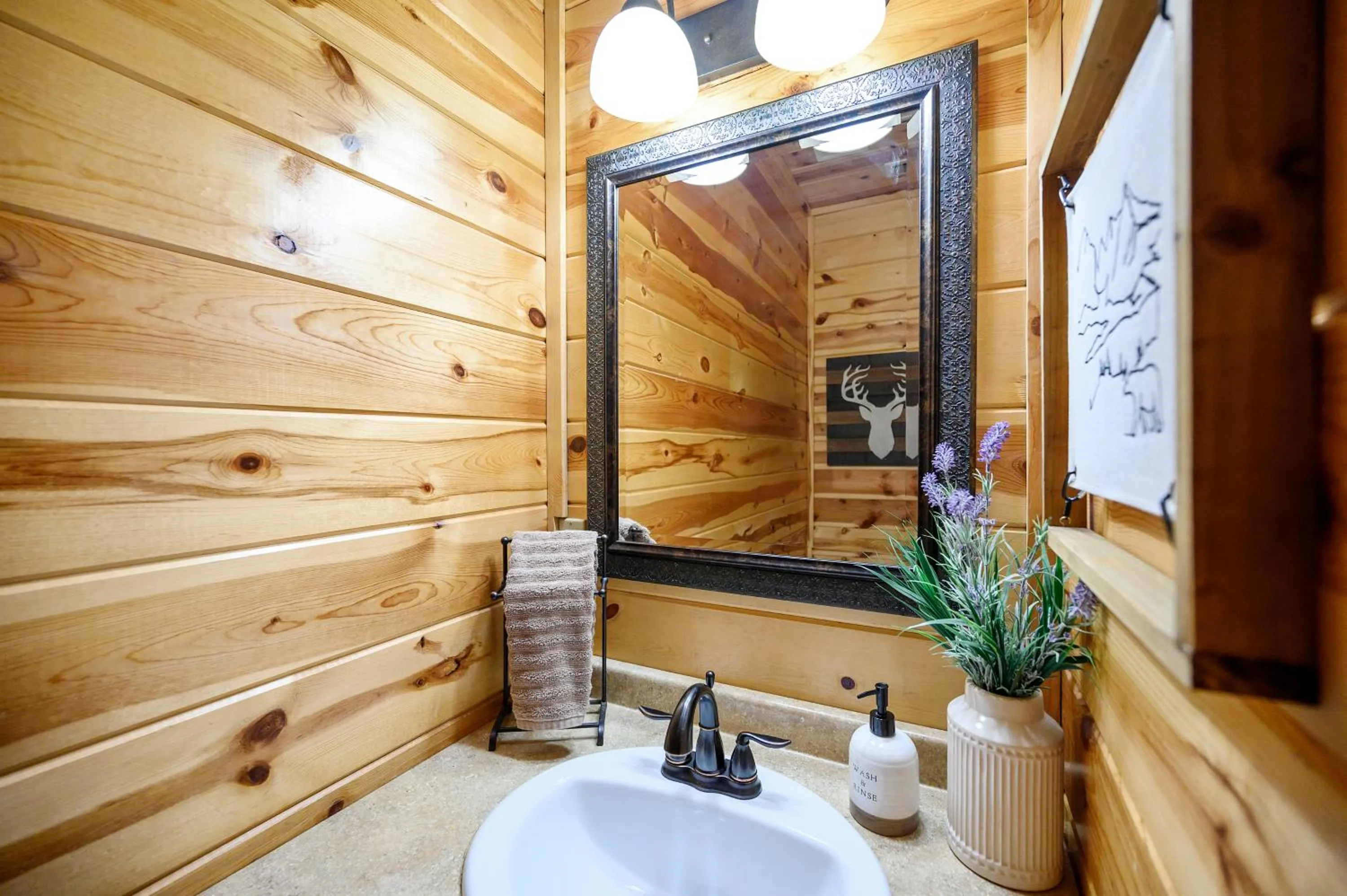 Bathroom in Hickory Bear - Cabin surrounded by pines, Sleeps 10, Hot Tub, Fire Pit, Arcade, Foosball Table & Deck Slide