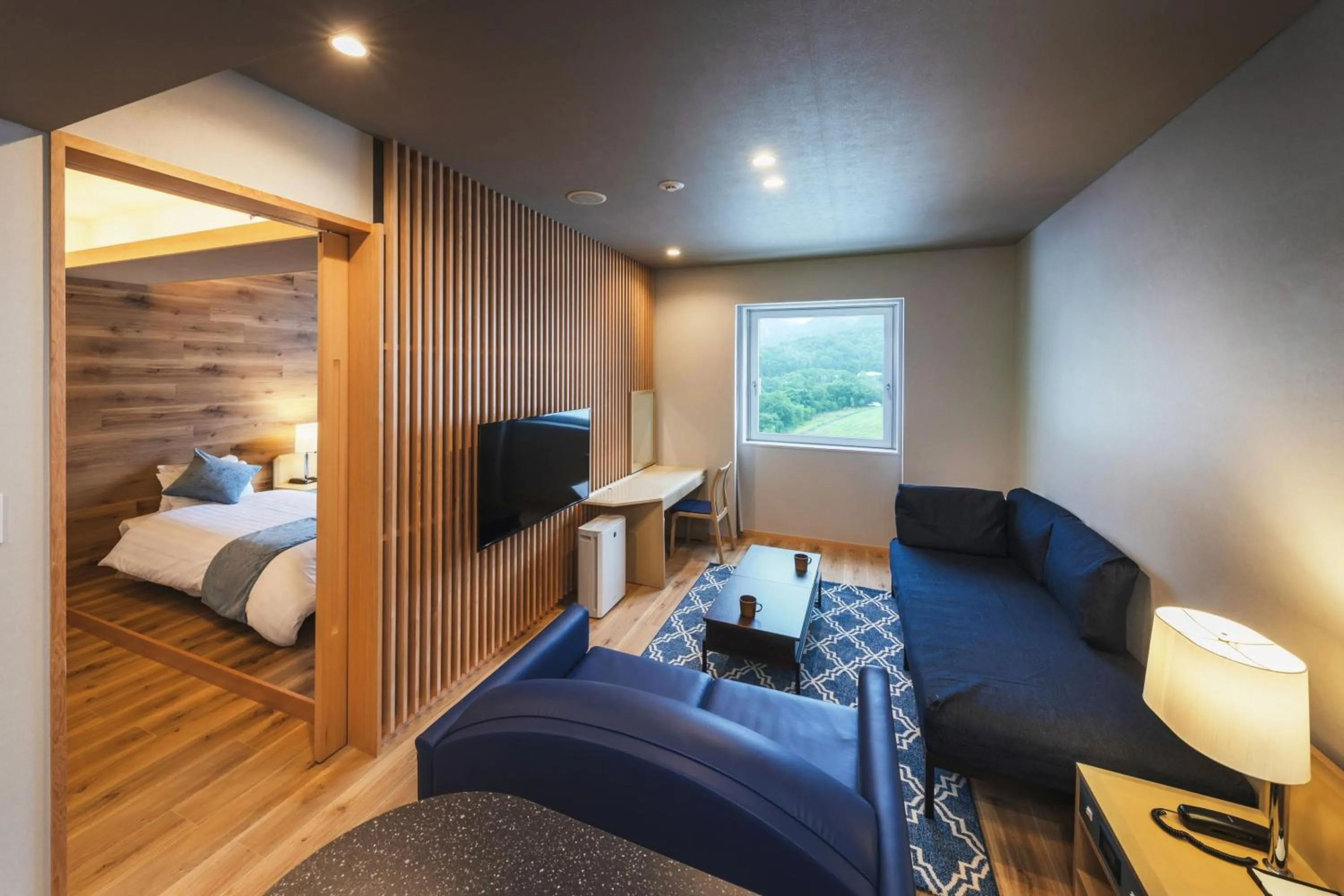 Bed in Takamiya Hotel Rurikura Resort