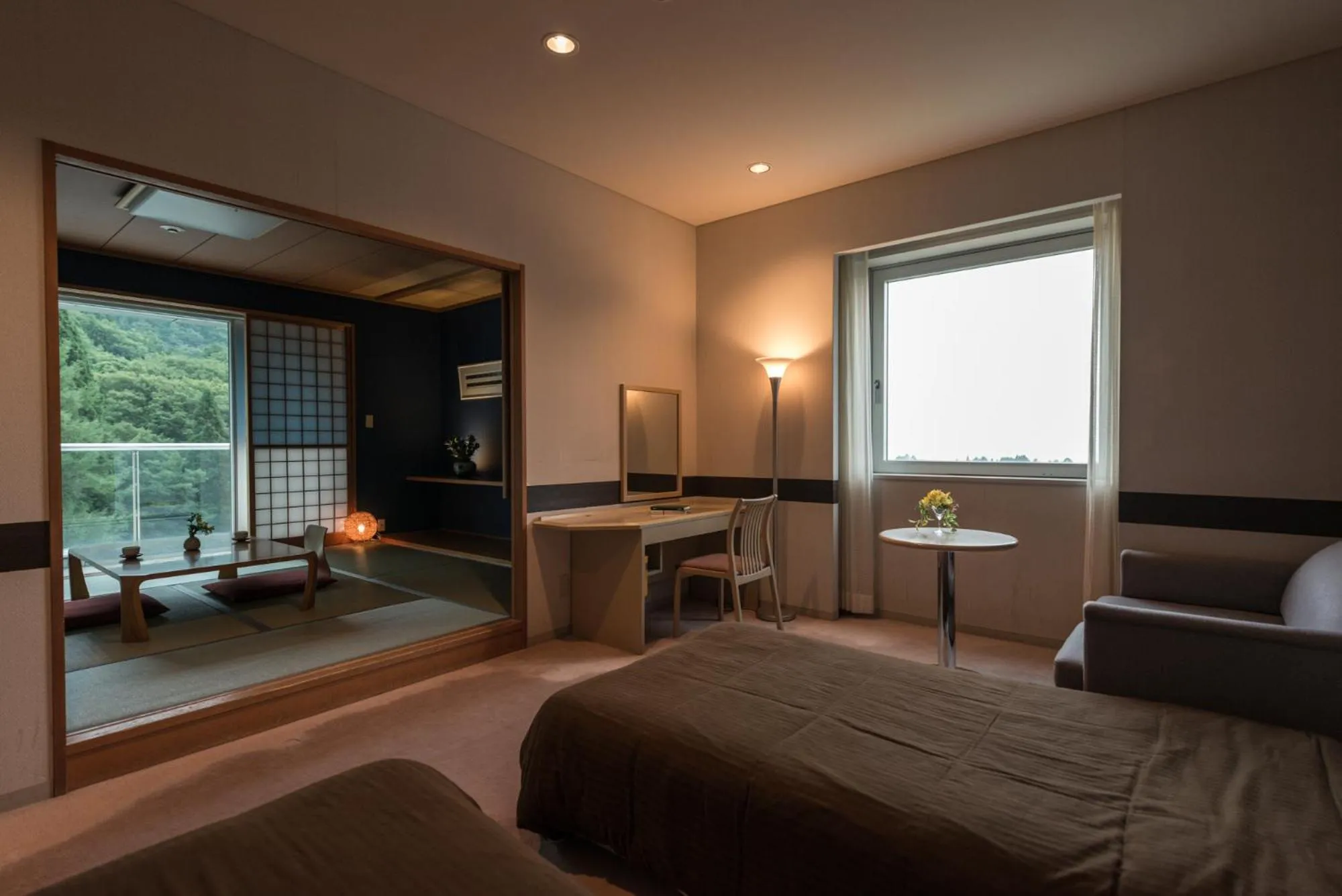 Bed in Takamiya Hotel Rurikura Resort