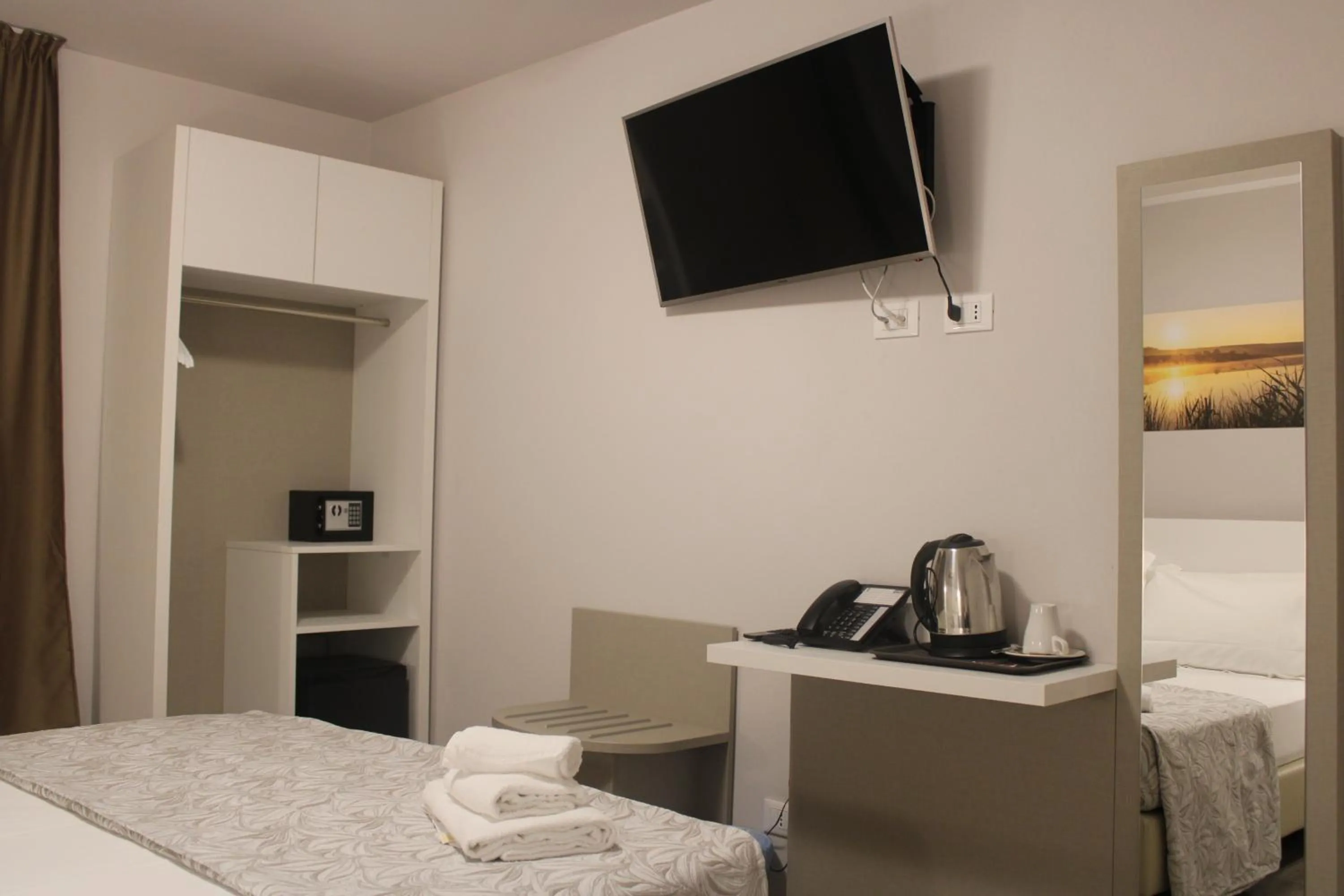 Bed in Hotel Acquario