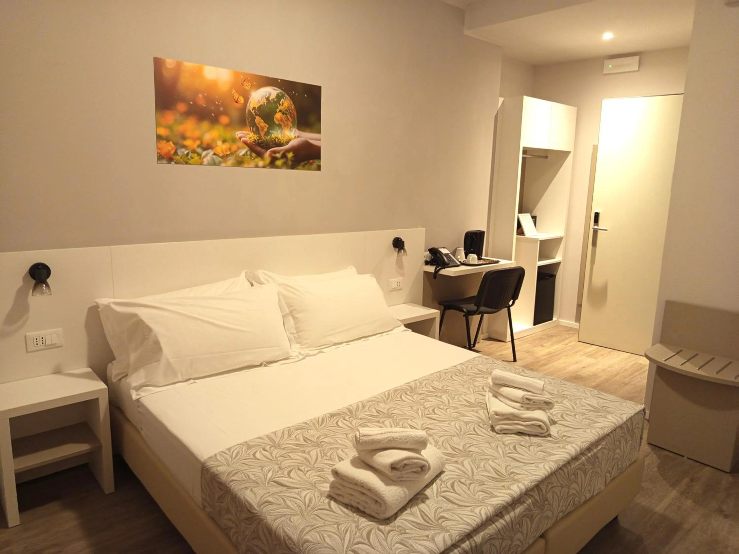 Bed in Hotel Acquario