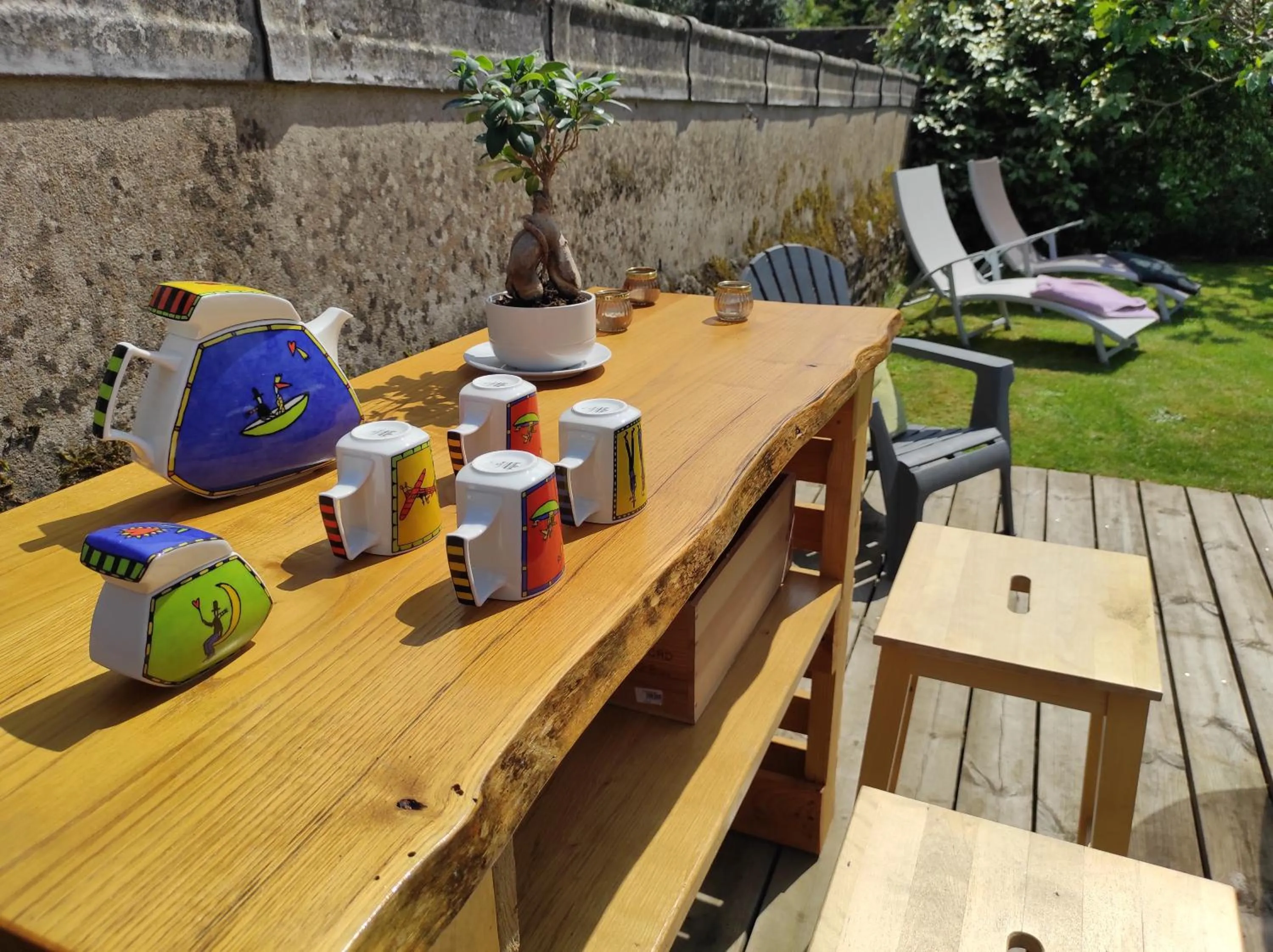 Lounge or bar in Aux Trois Palmiers