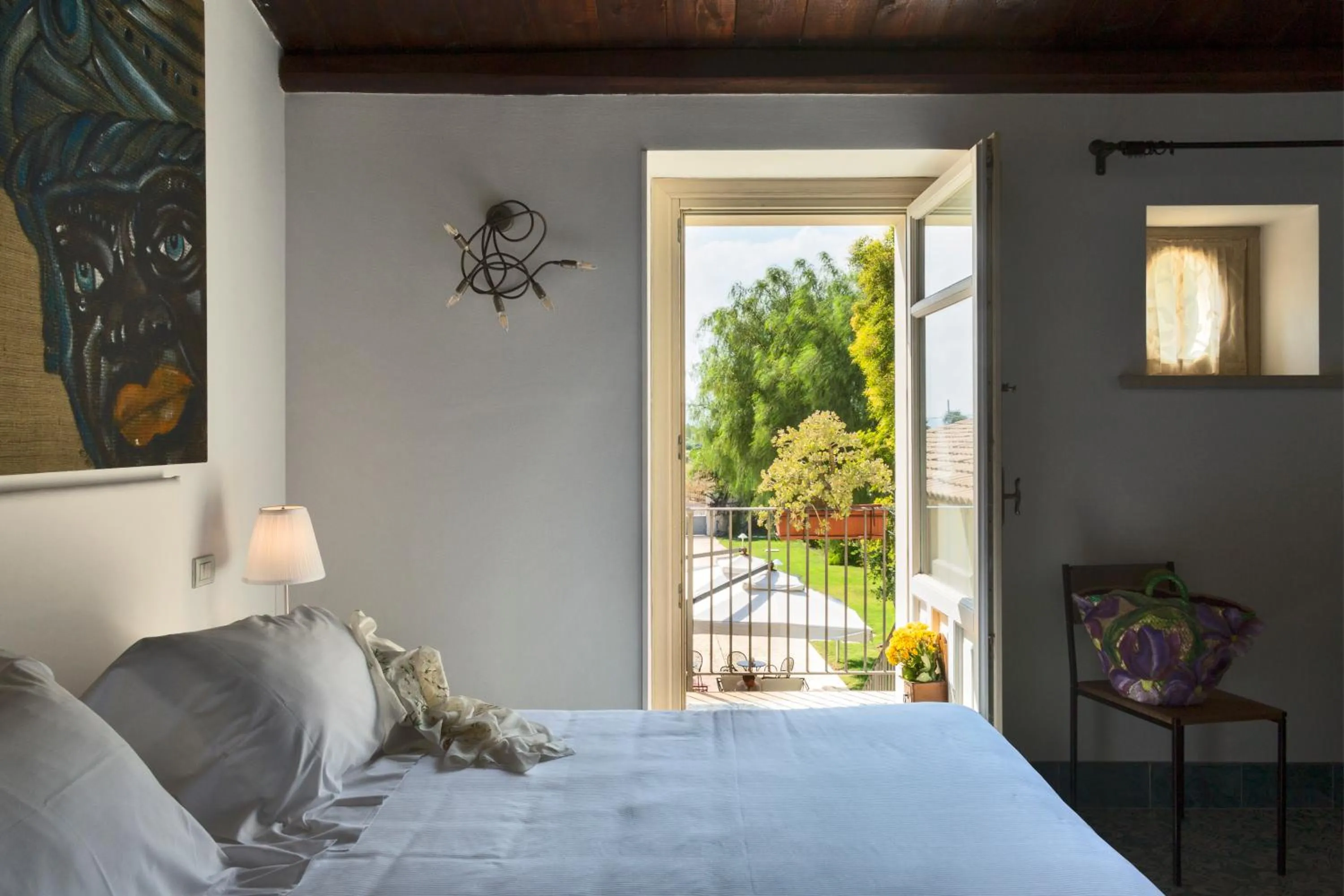 Bed in Dimora Caiammari Luxury Hotel & Spa