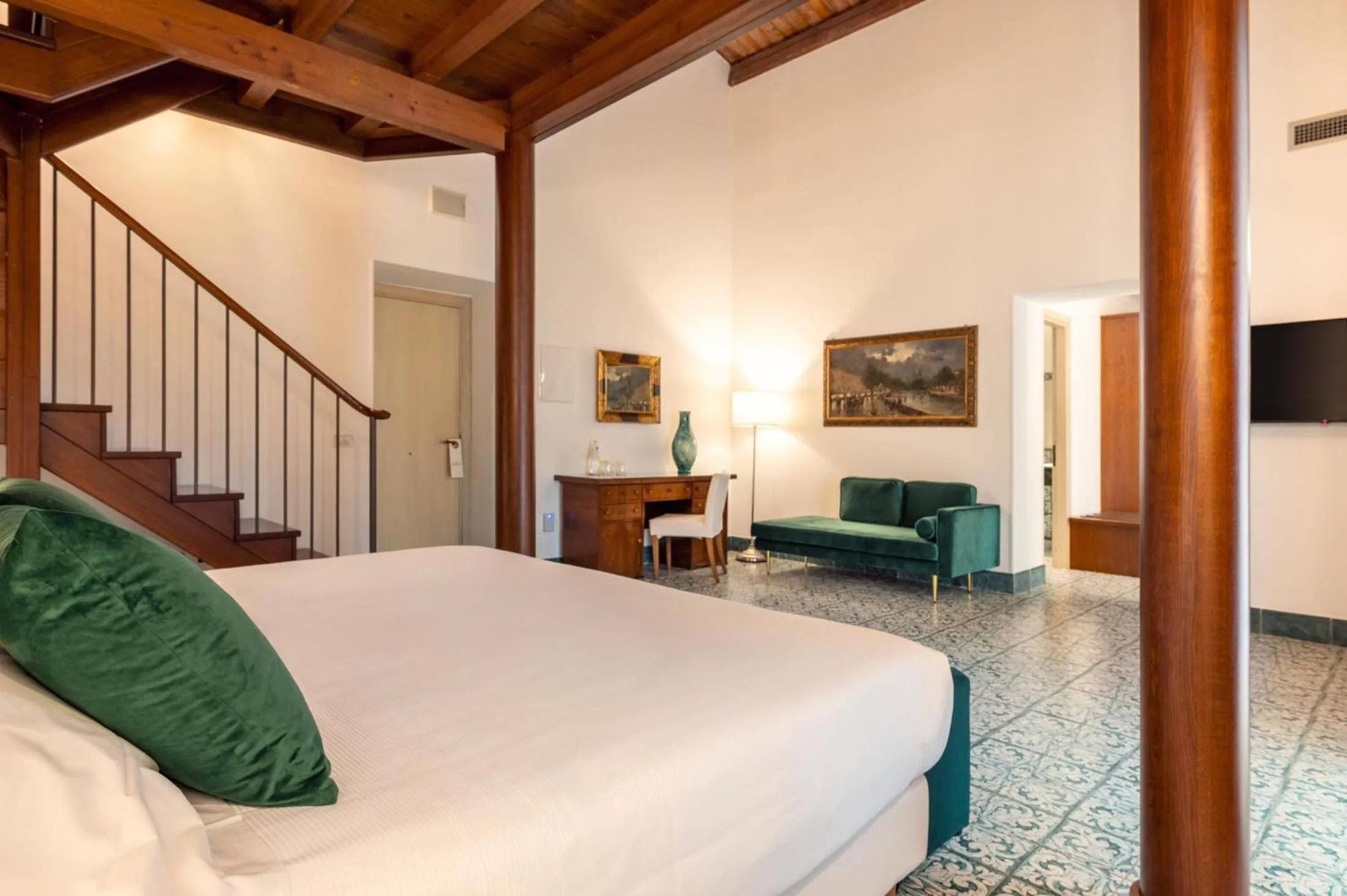 Bed in Dimora Caiammari Luxury Hotel & Spa