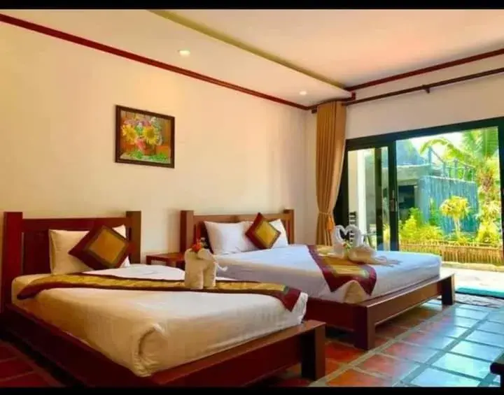 Deluxe Triple Room in Vang Vieng Savanh Sunset View Resort Deluxe Triple Room in Vang Vieng Savanh Sunset View Resort