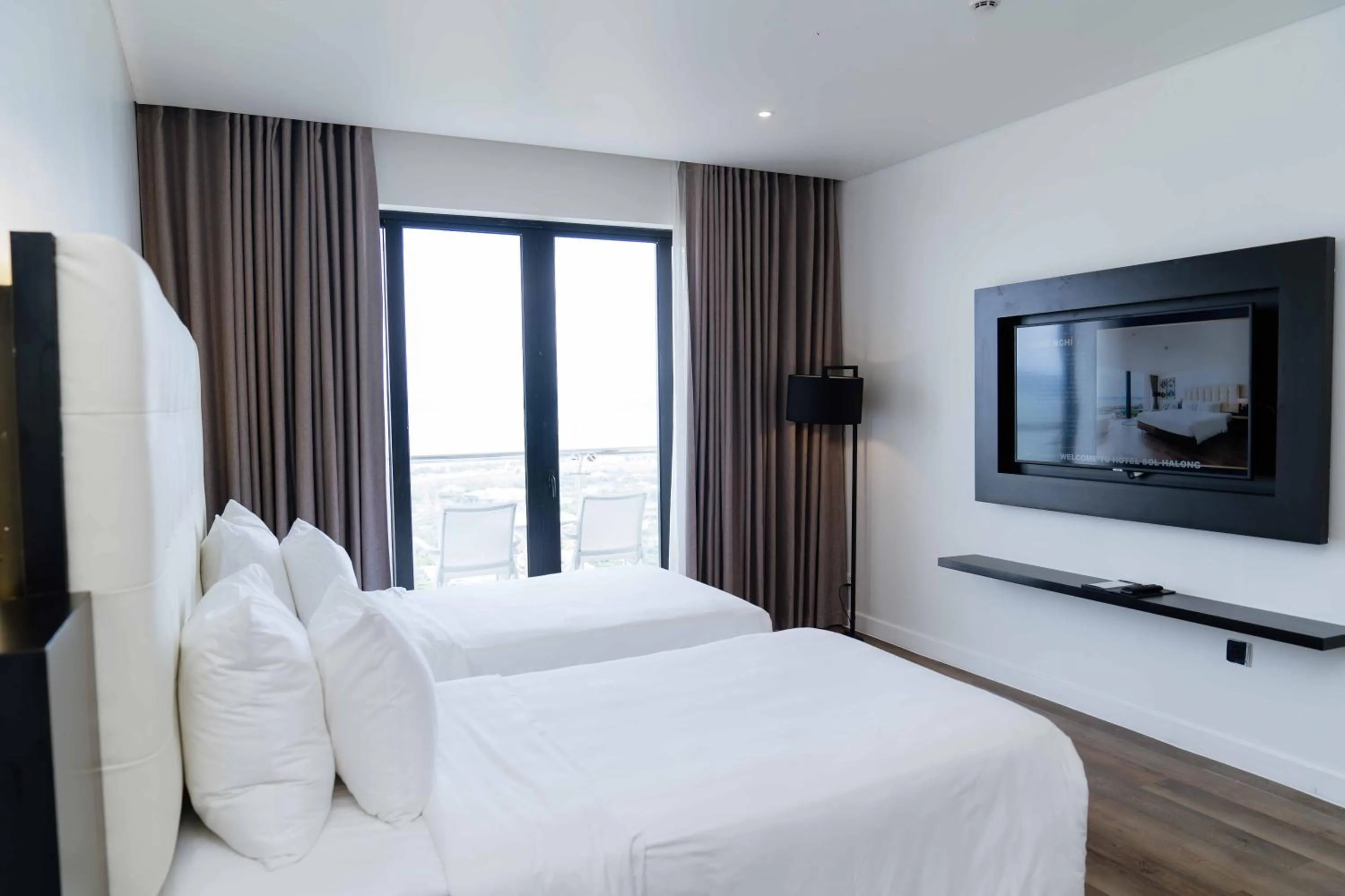 Bed in Hotel Soleil Ha Long, Trademark Collection by Wyndham