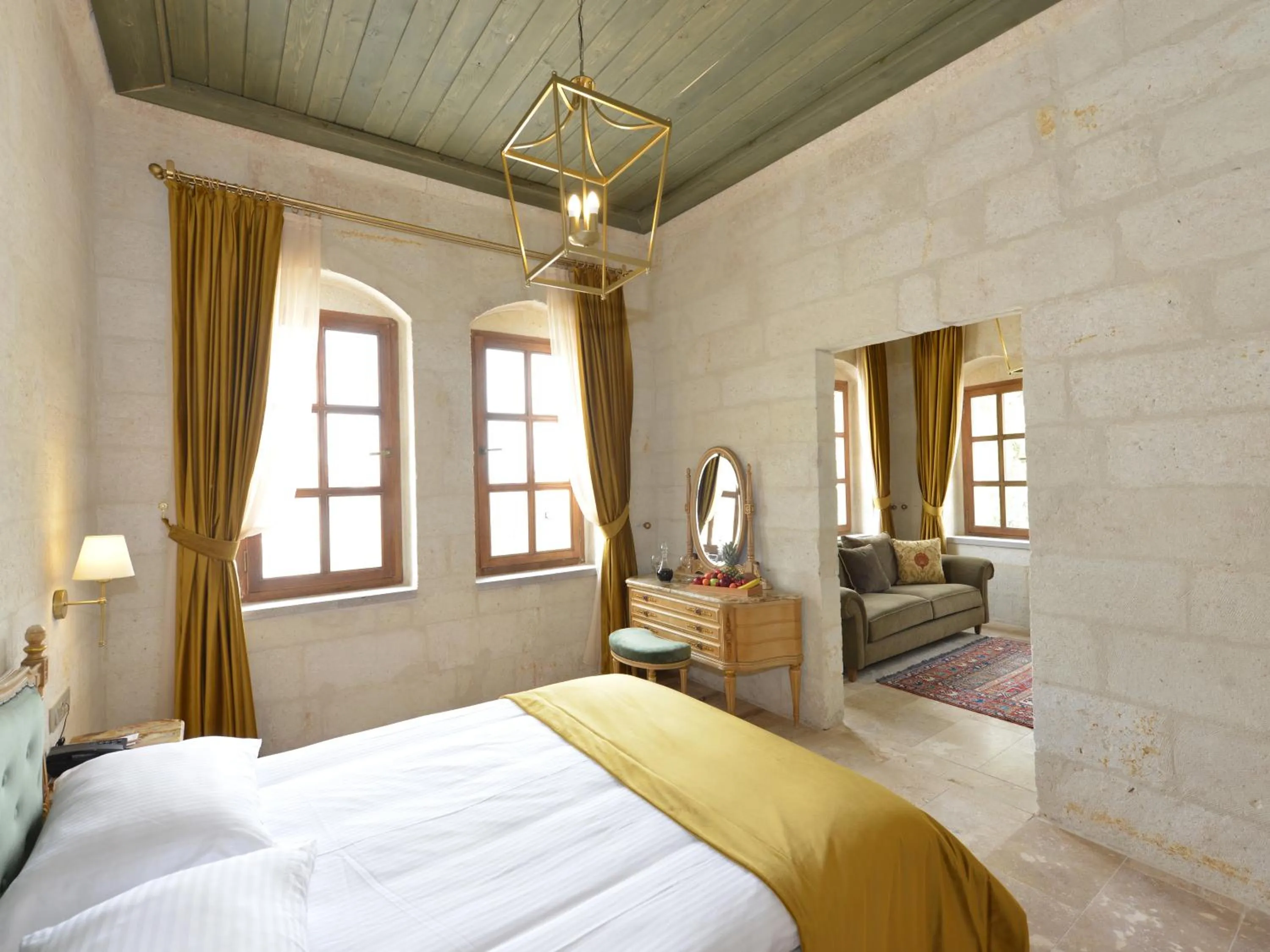 Bed in Evanthia Cave Suites - Special Class