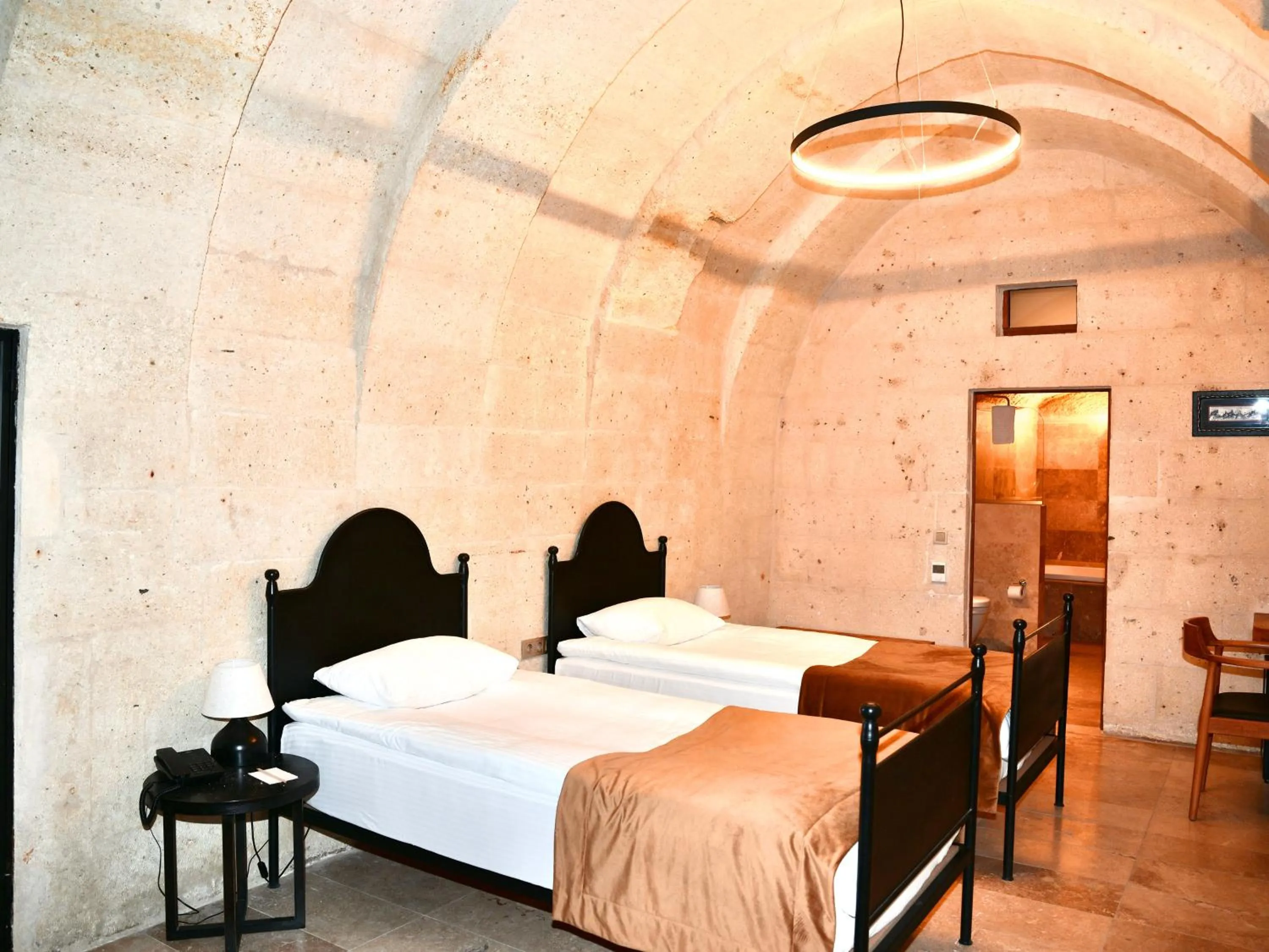 Photo of the whole room, Bed in Evanthia Cave Suites - Special Class