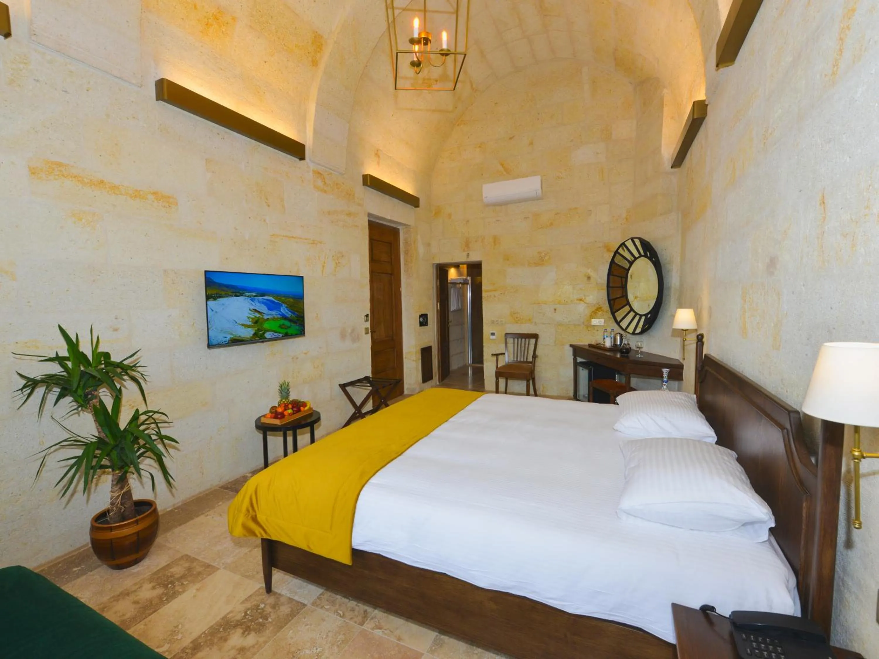 Bedroom, Bed in Evanthia Cave Suites - Special Class