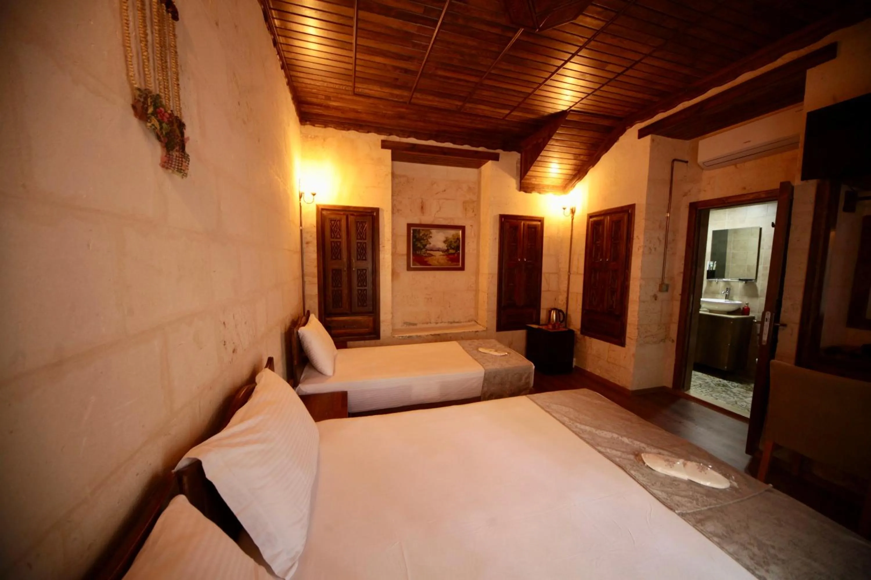 Bed in Kaliruha Hotel