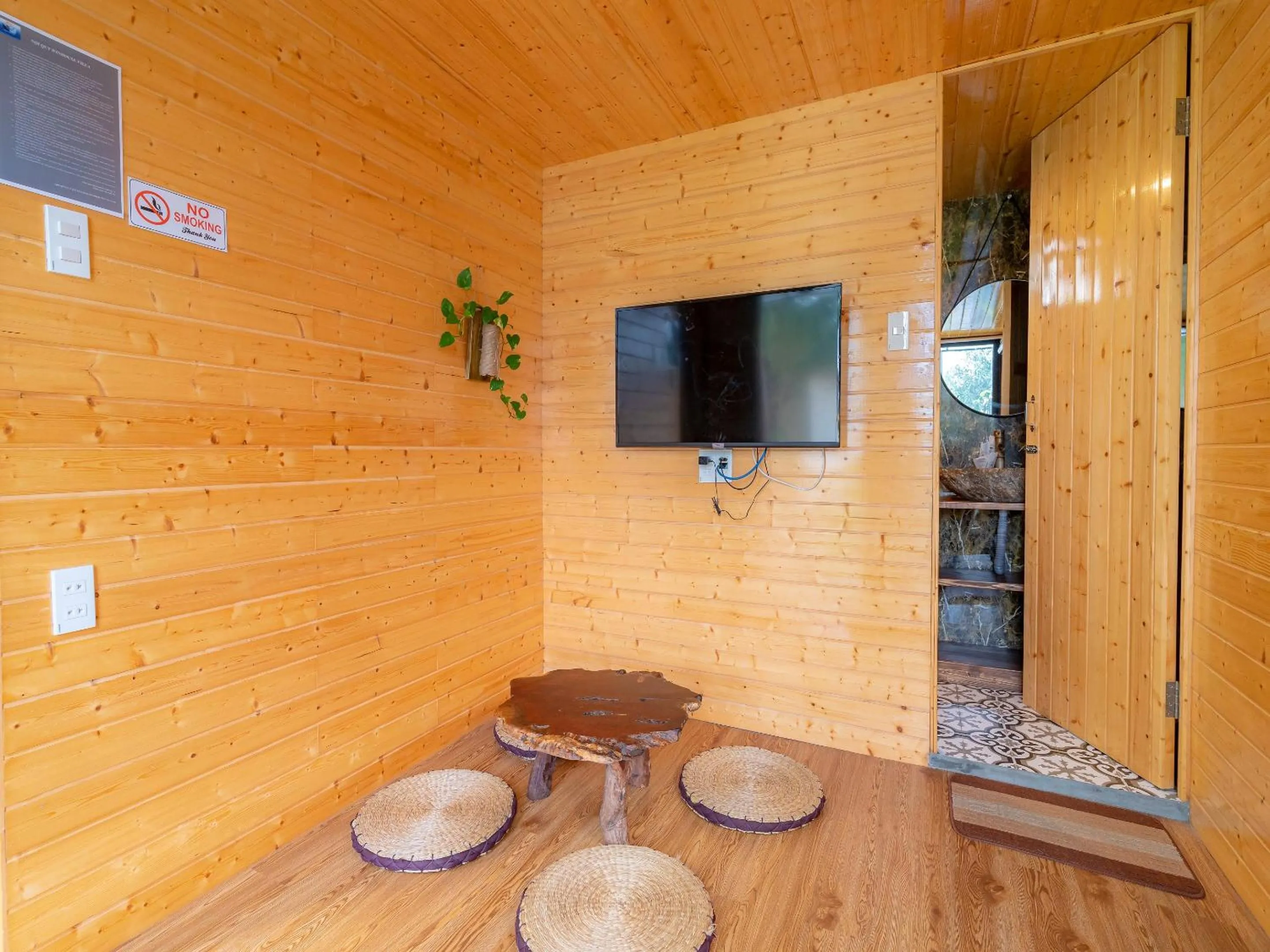 Communal lounge/ TV room in Winhouse Villa