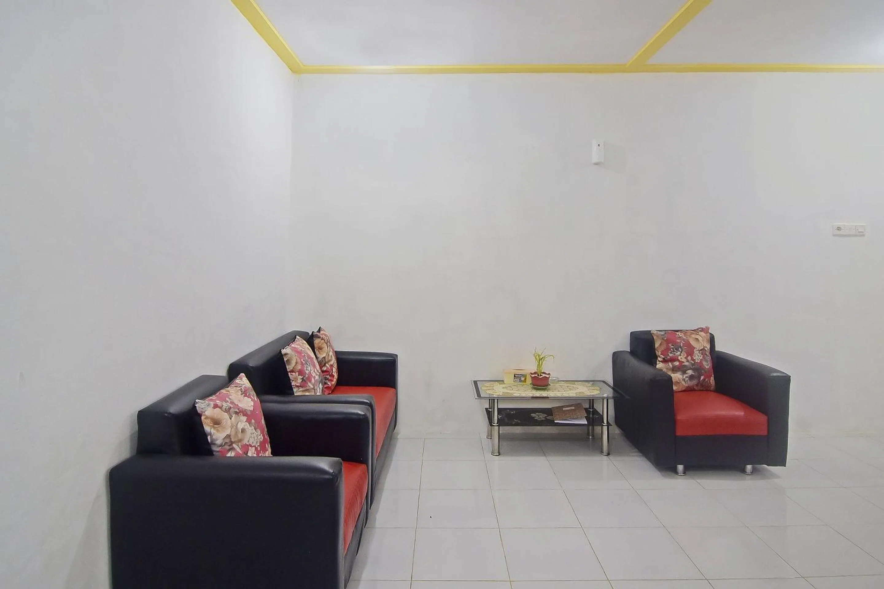 Bedroom in Hotel O Pulisan Ekowisata Homestay Near Wisata Pantai Desa Pulisan (Pulisan Beach Tour)