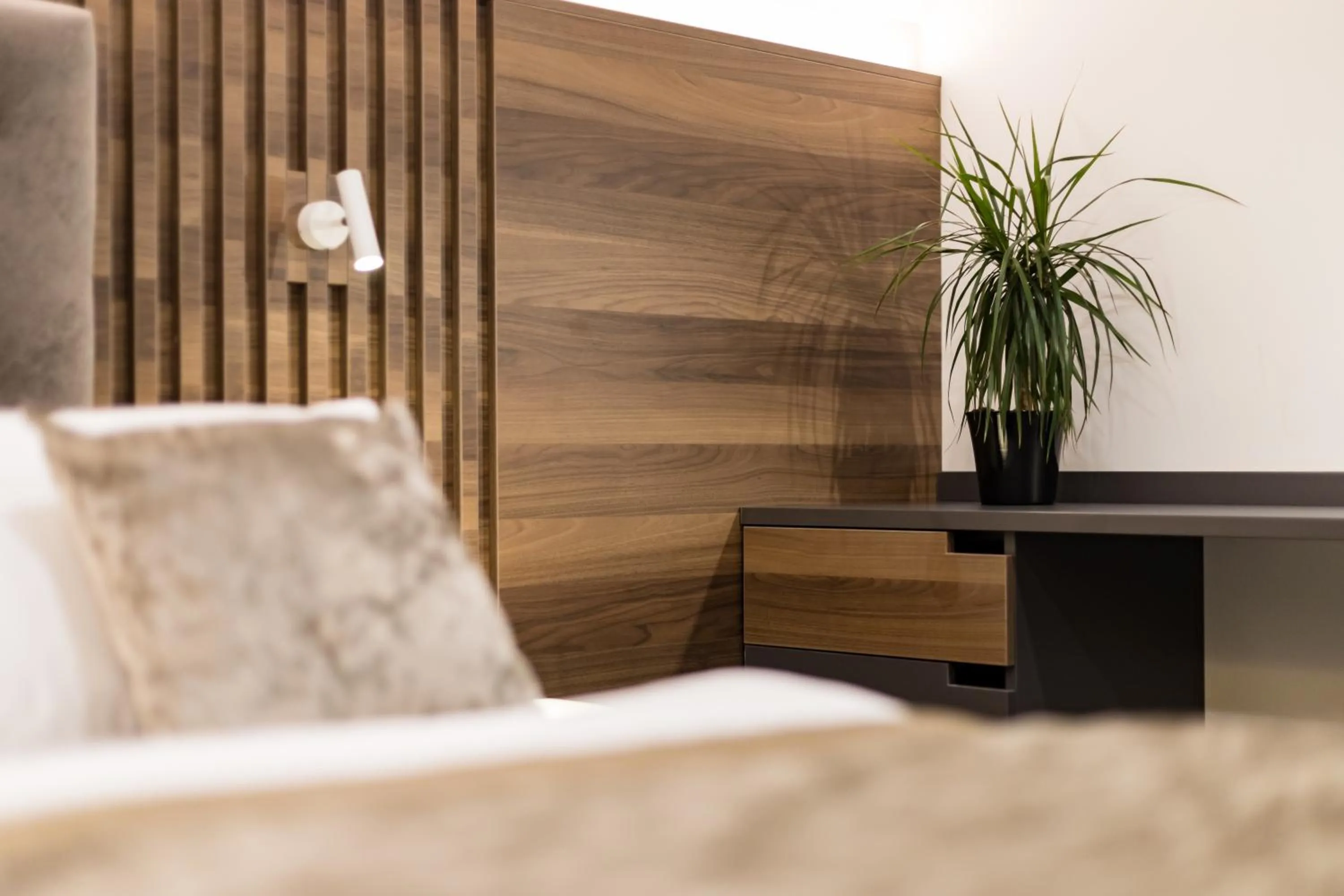 Bed in Garni Hotel Cirman