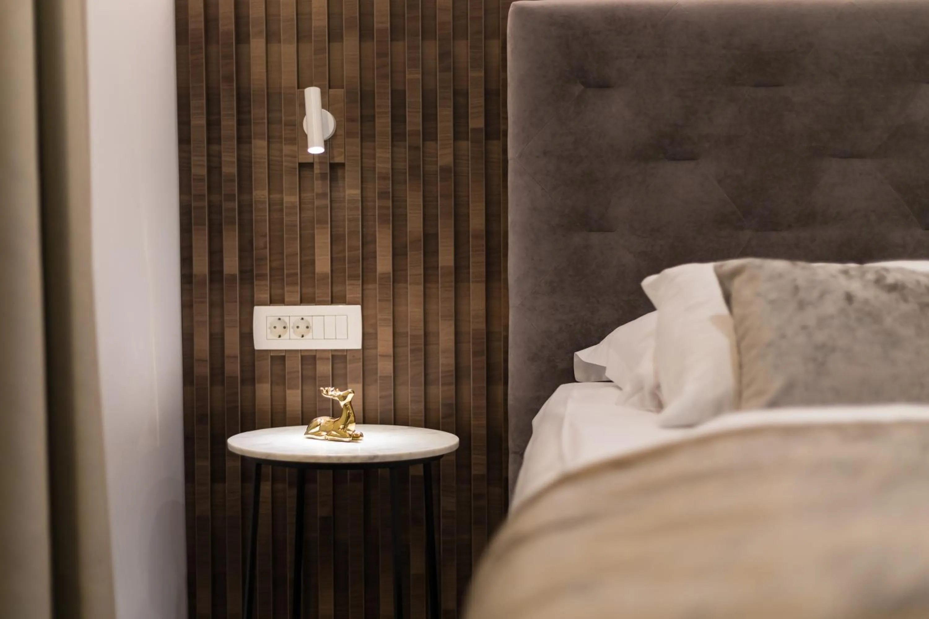 Bed in Garni Hotel Cirman