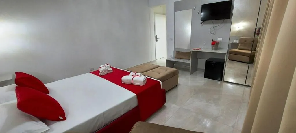 Communal lounge/ TV room in IL GIGLIO B&B