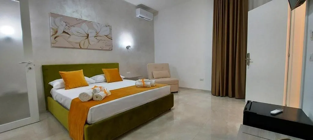 Bed in IL GIGLIO B&B