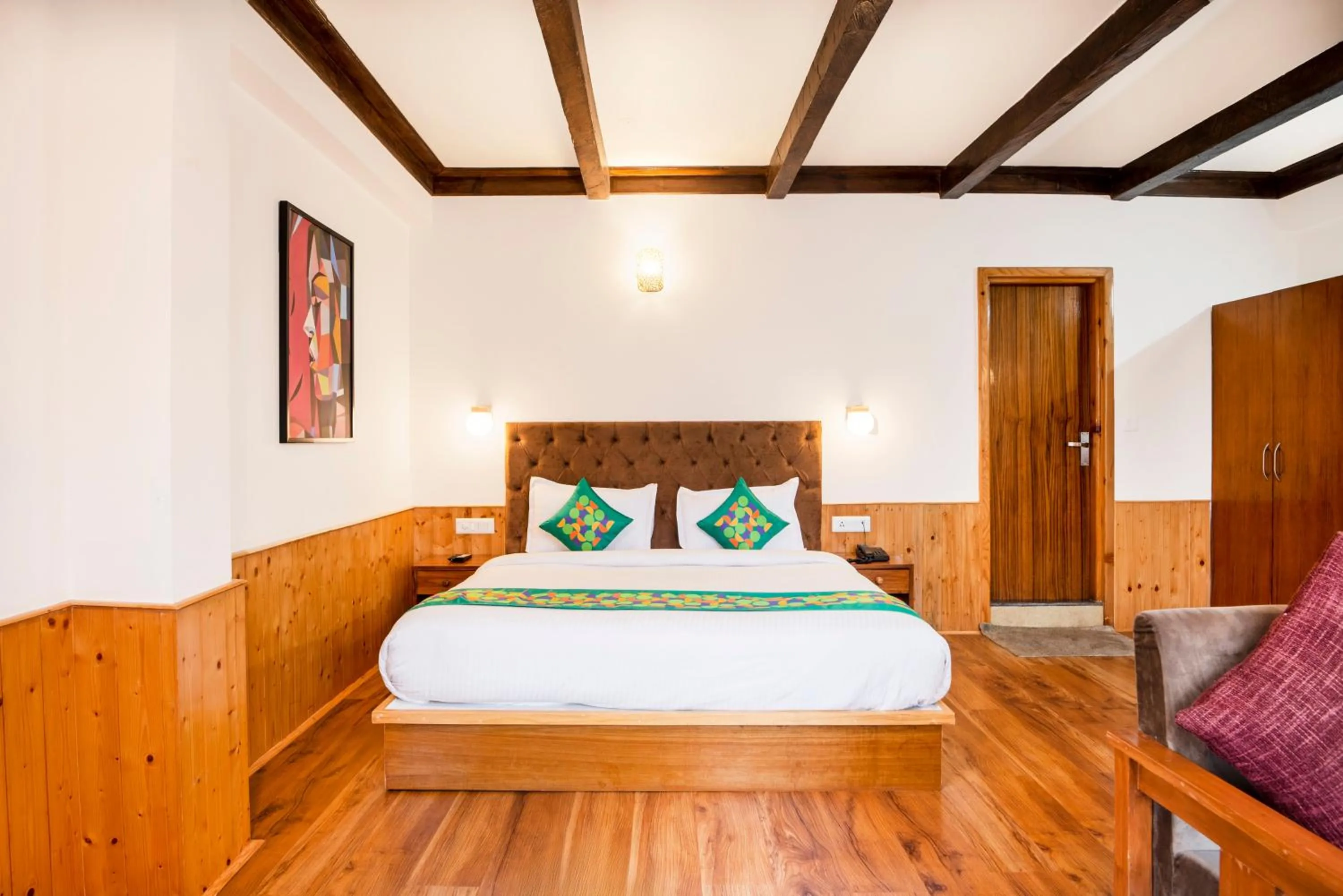 Bedroom, Bed in Treebo Premium Sattva With Mountain View