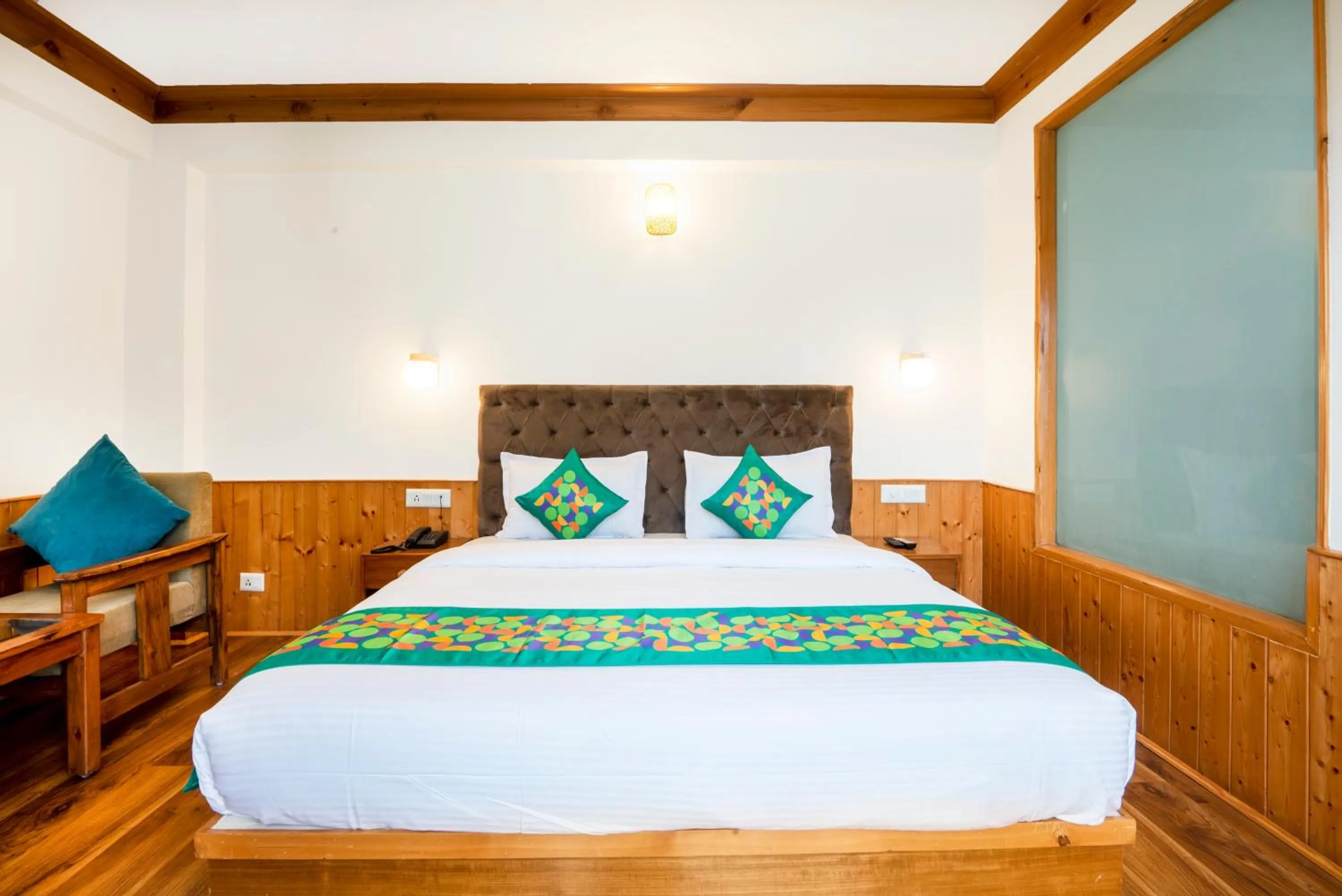 Bedroom, Bed in Treebo Premium Sattva With Mountain View
