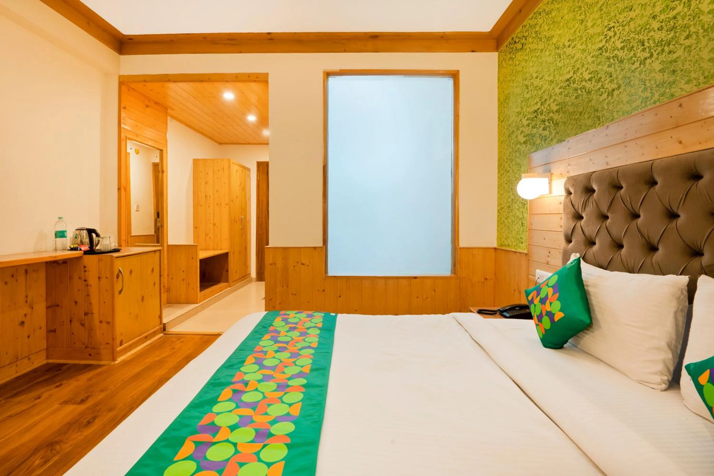 Bedroom, Bed in Treebo Premium Sattva With Mountain View