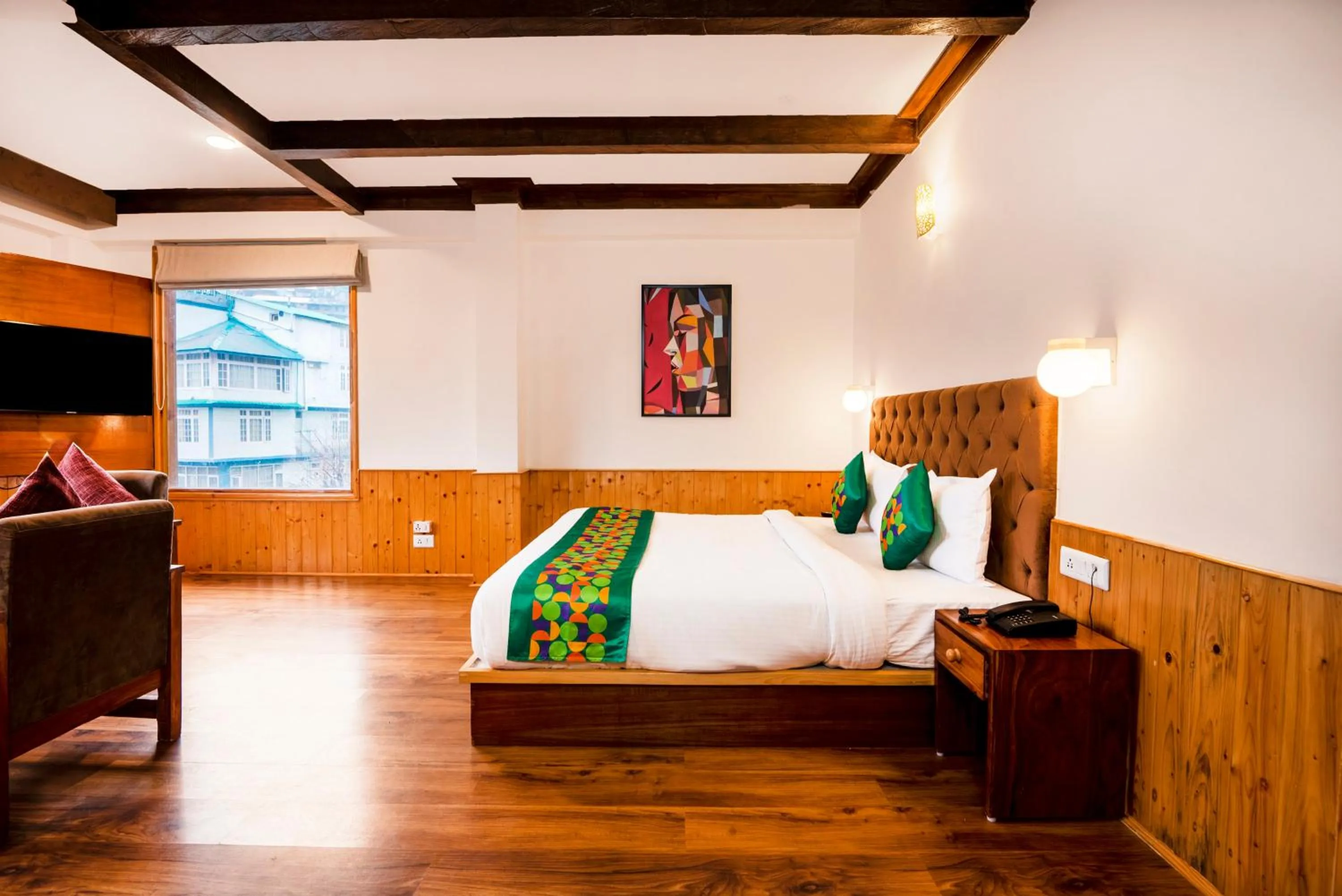 Bedroom, Bed in Treebo Premium Sattva With Mountain View