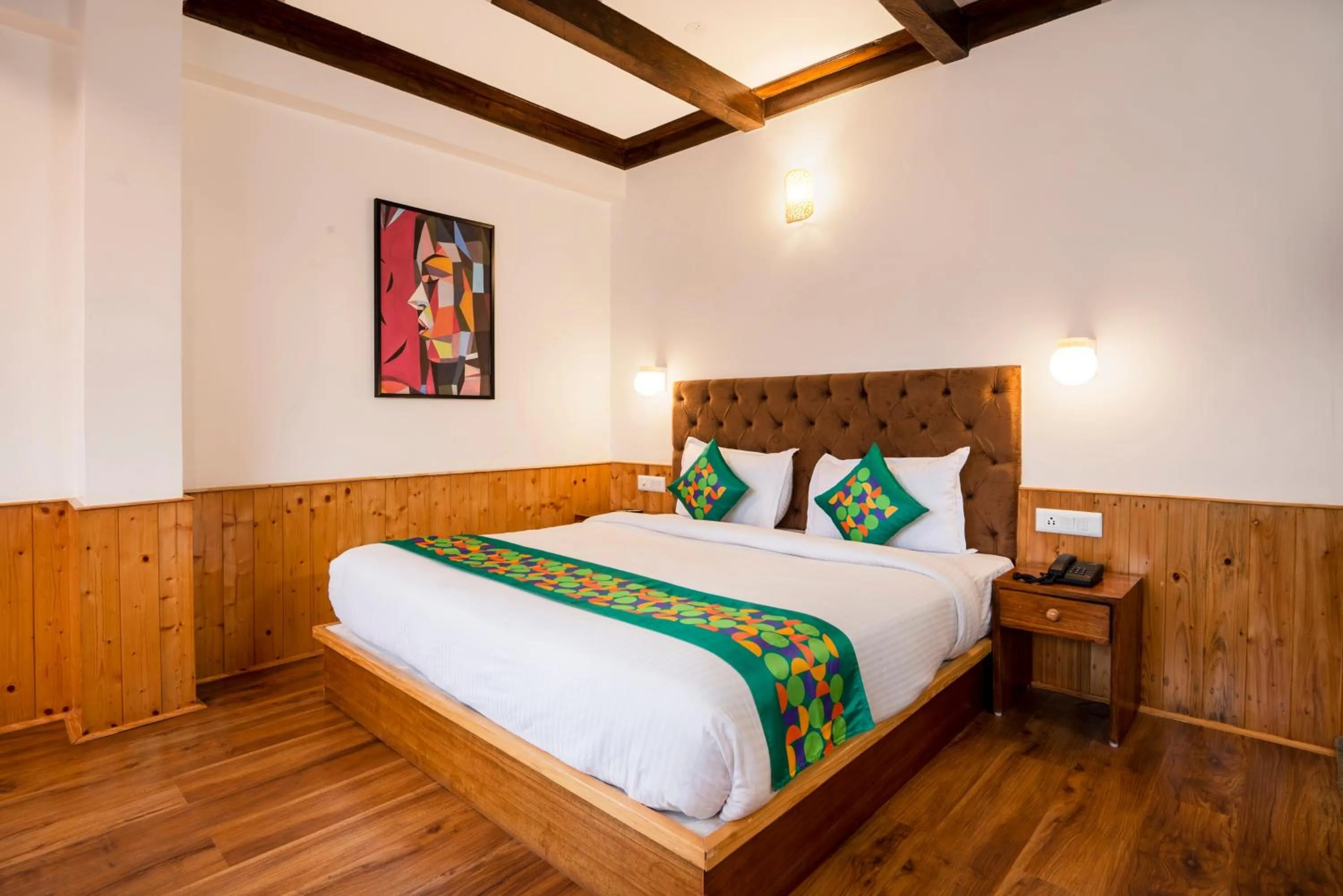 Bedroom, Bed in Treebo Premium Sattva With Mountain View