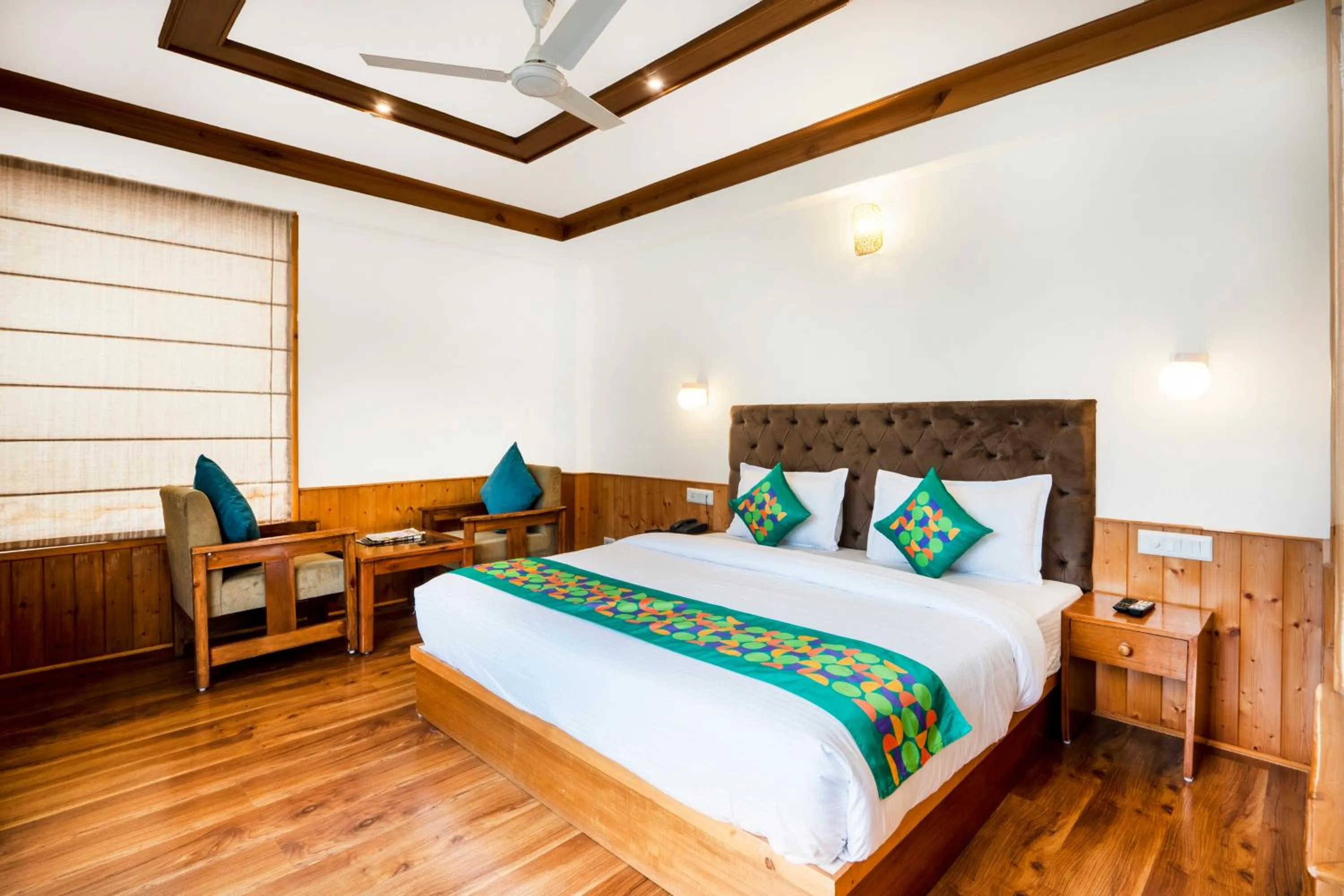 Bedroom, Bed in Treebo Premium Sattva With Mountain View