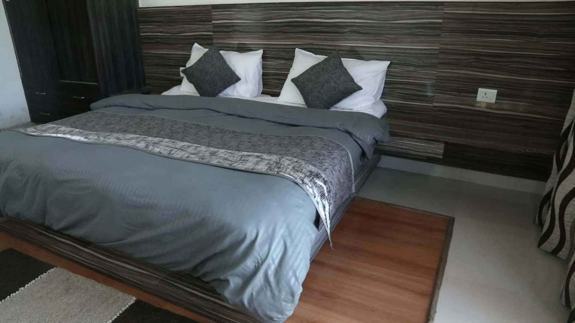 Bed in Just Naturals Wellness Resort Nainital