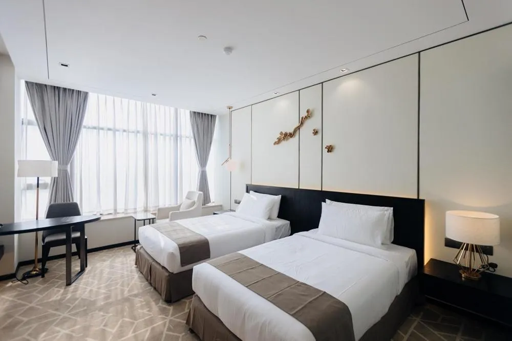 Bedroom in Ease Hotel