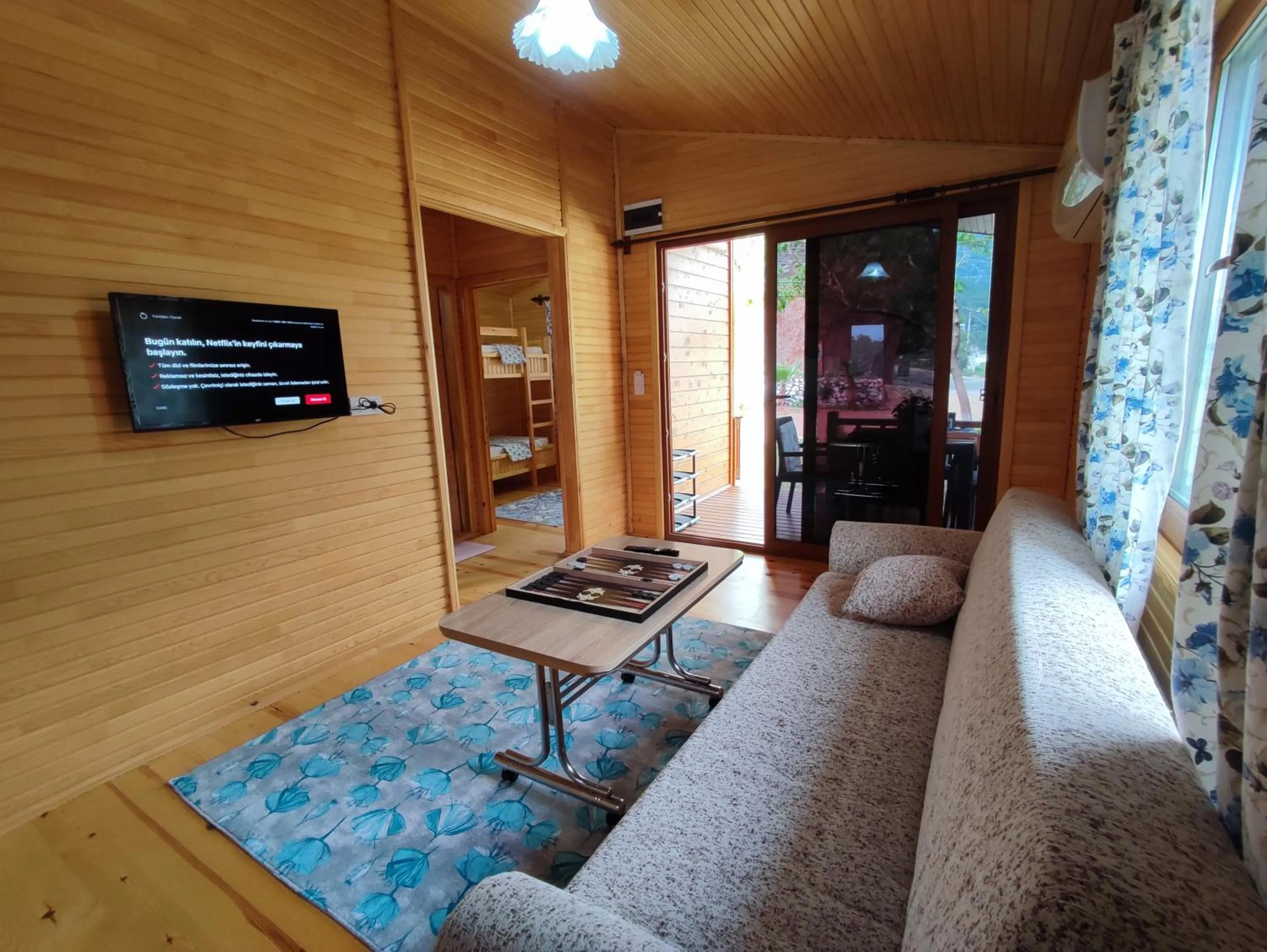 Communal lounge/ TV room in Hurmalik Aparts & Bungalows - Family Bungalows - Large Garden Bungalow with Barbecue