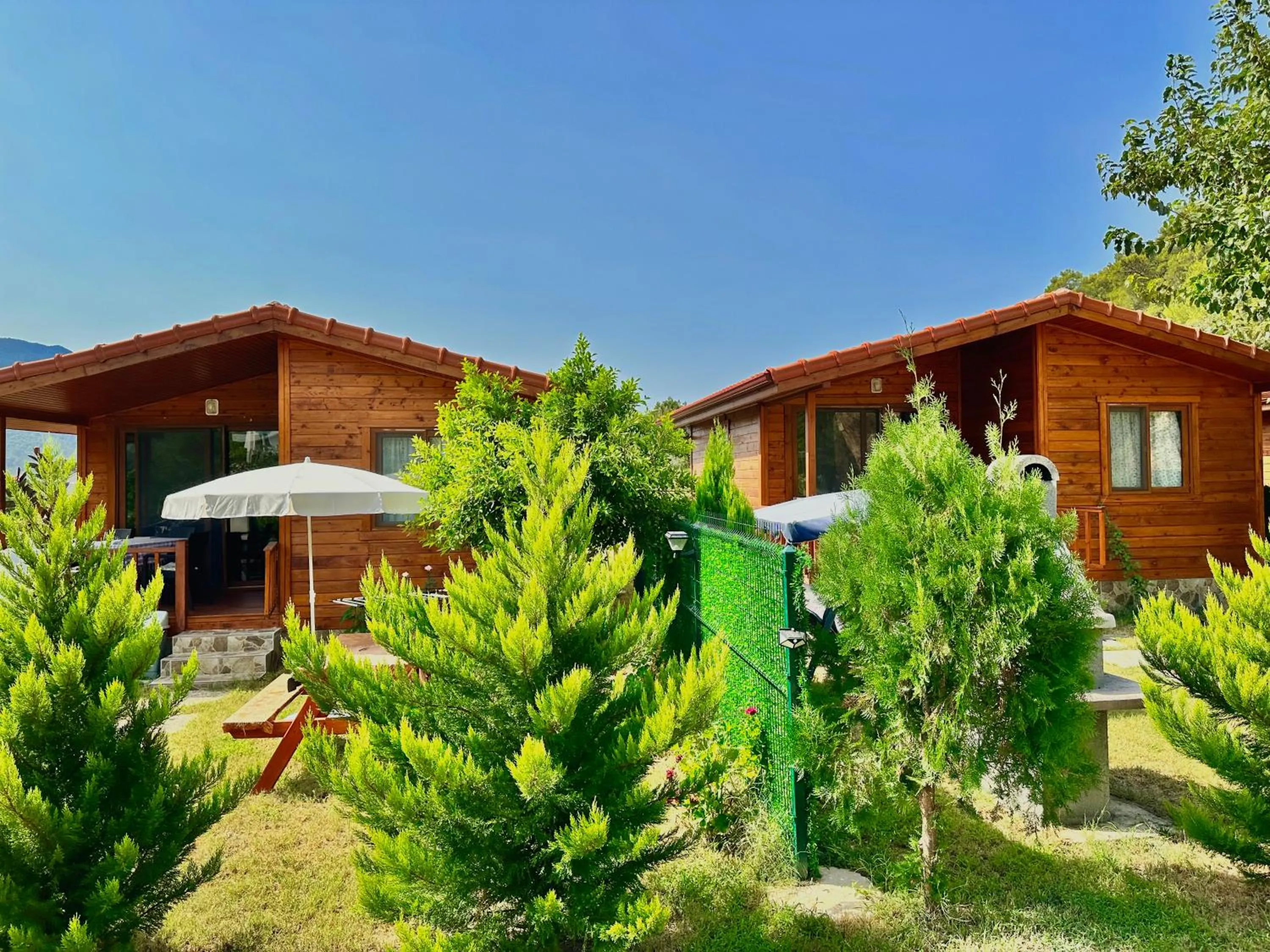 Property building in Hurmalik Aparts & Bungalows - Family Bungalows - Large Garden Bungalow with Barbecue