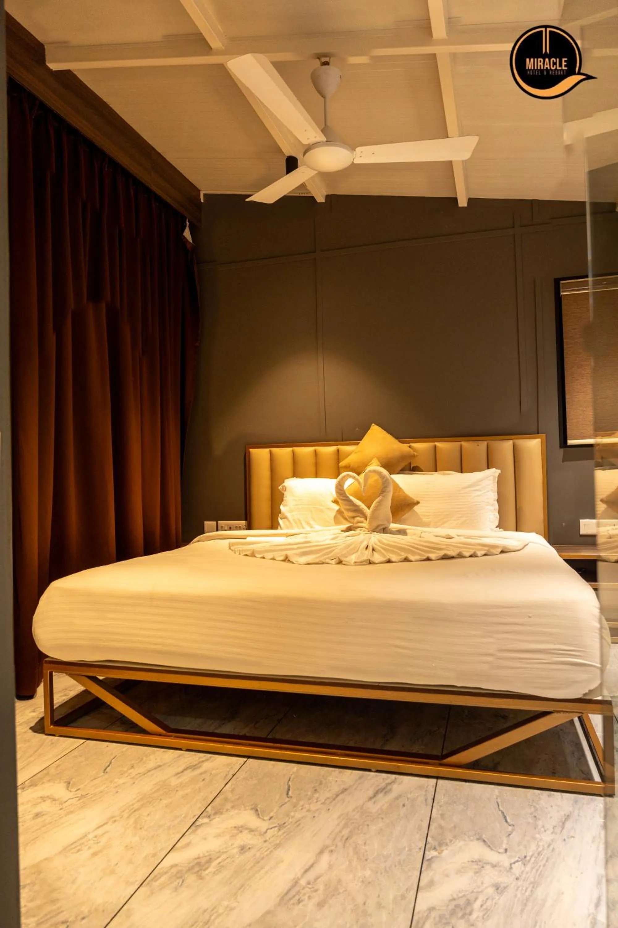 Photo of the whole room, Bed in Miracle Hotel and Resorts