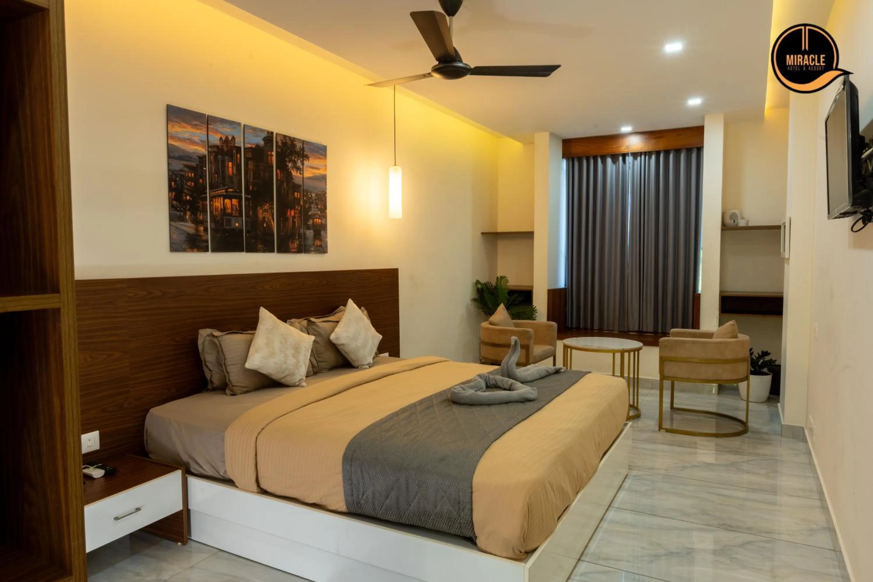 Bed in Miracle Hotel and Resorts