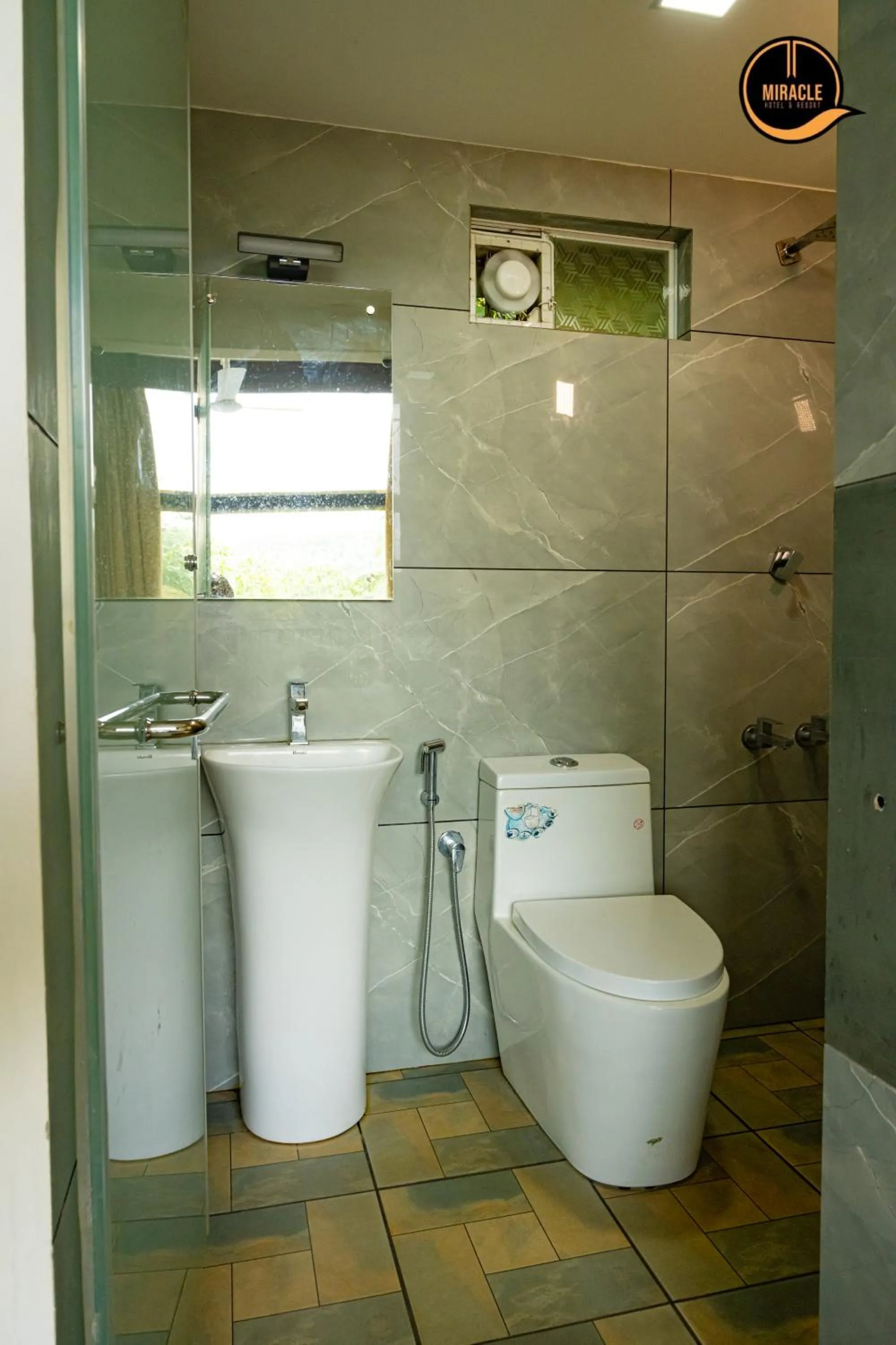 Shower in Miracle Hotel and Resorts