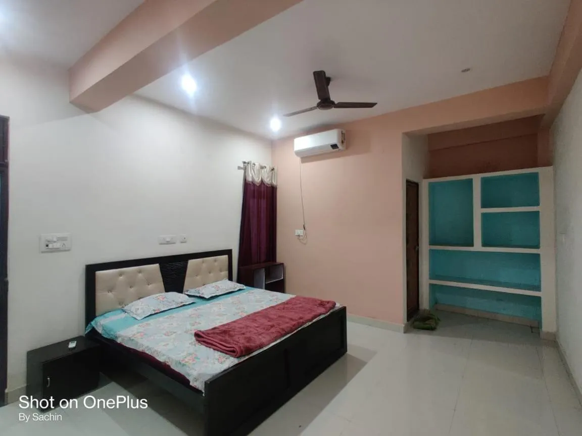 Bed in JK Royal Palace And Lodge