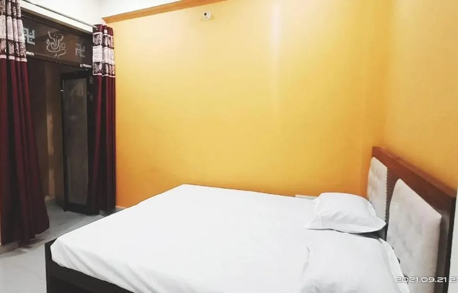 Bed in JK Royal Palace And Lodge