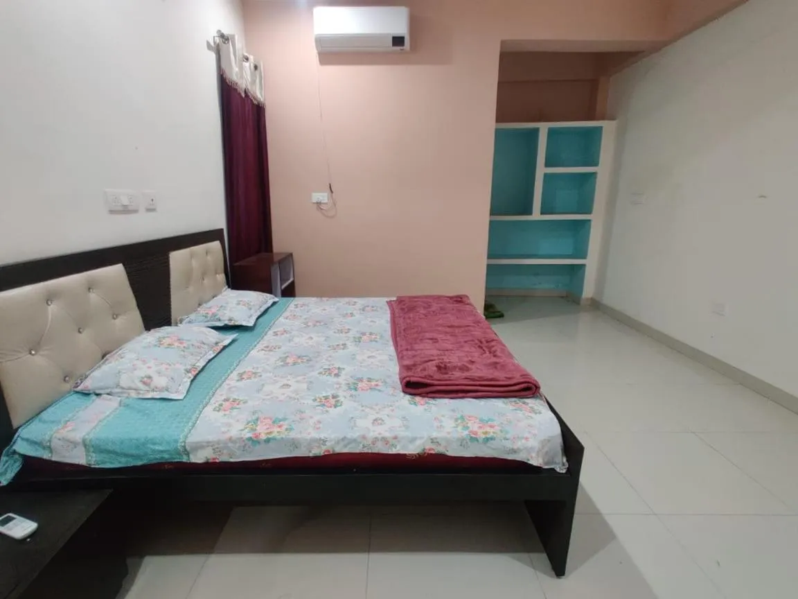 Bed in JK Royal Palace And Lodge