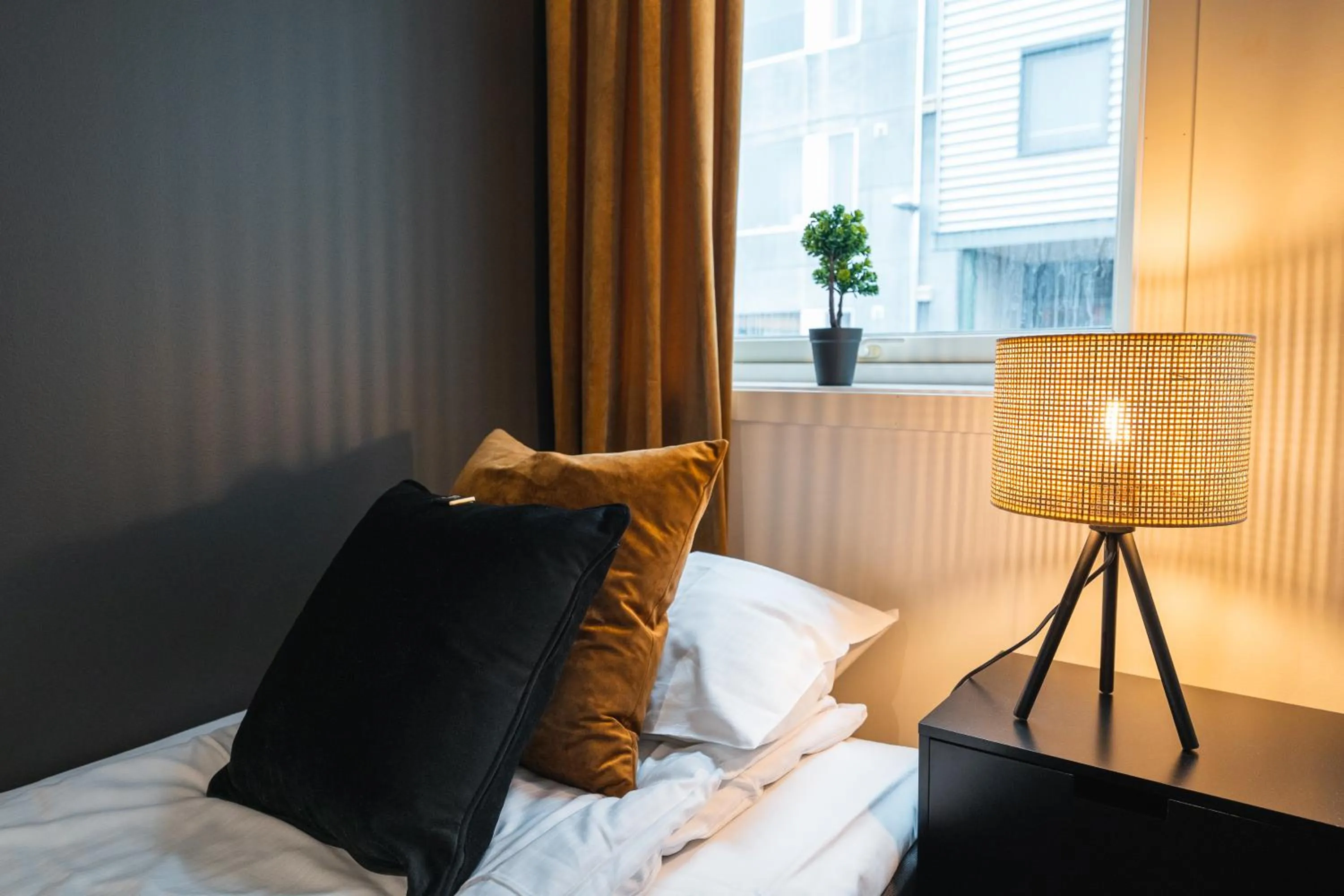 Bed in TotalApartments Seminarbakken City Studio