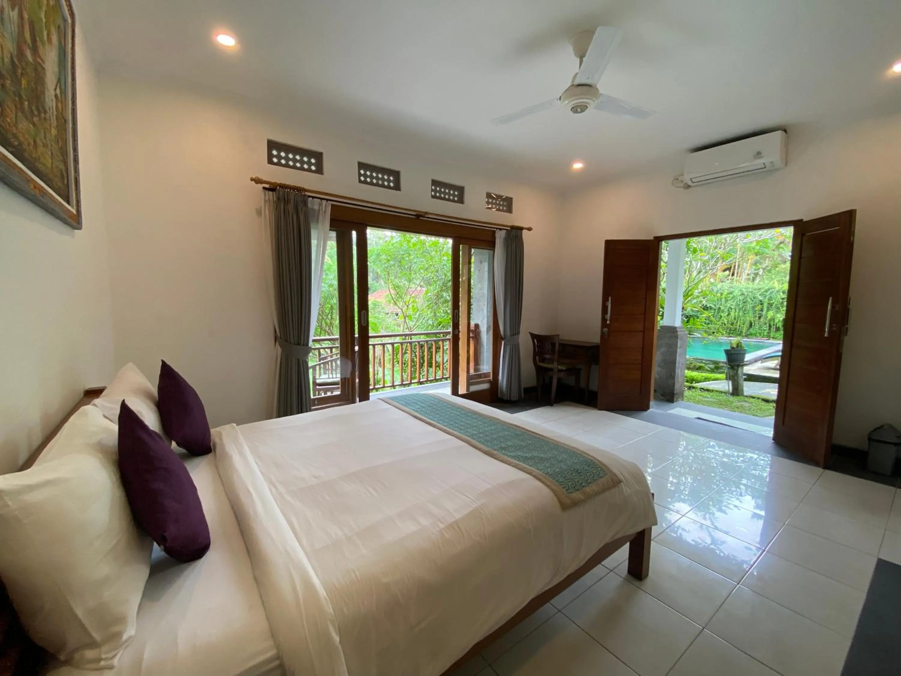 Bed in Nyoman Homestay Ubud