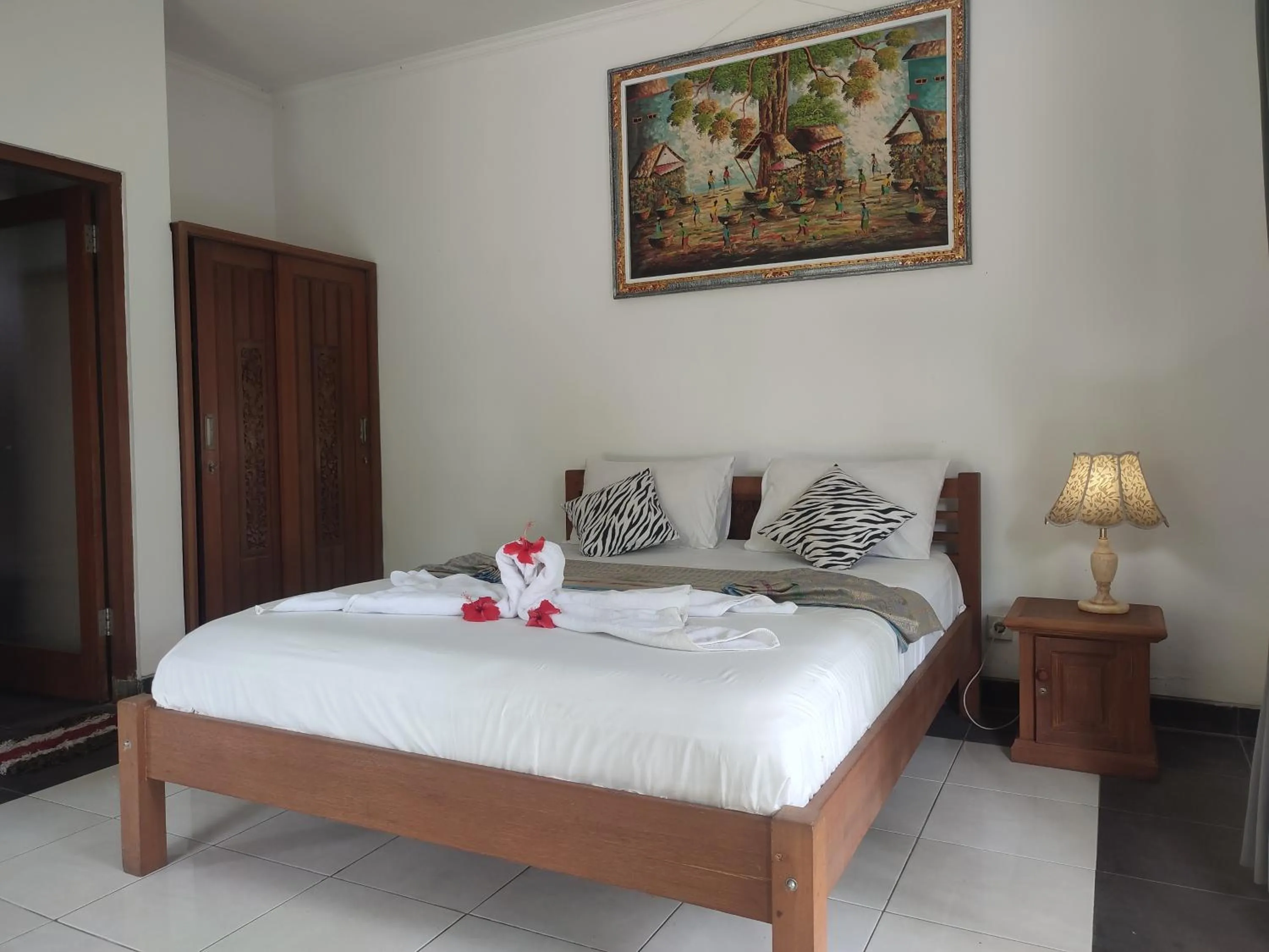 Bed in Nyoman Homestay Ubud