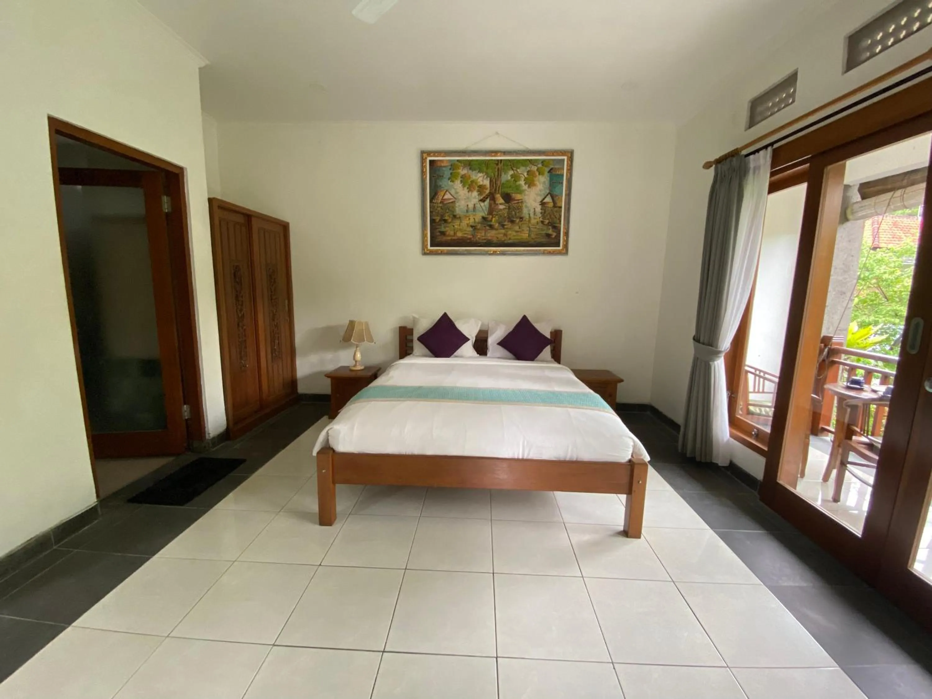 Bed in Nyoman Homestay Ubud