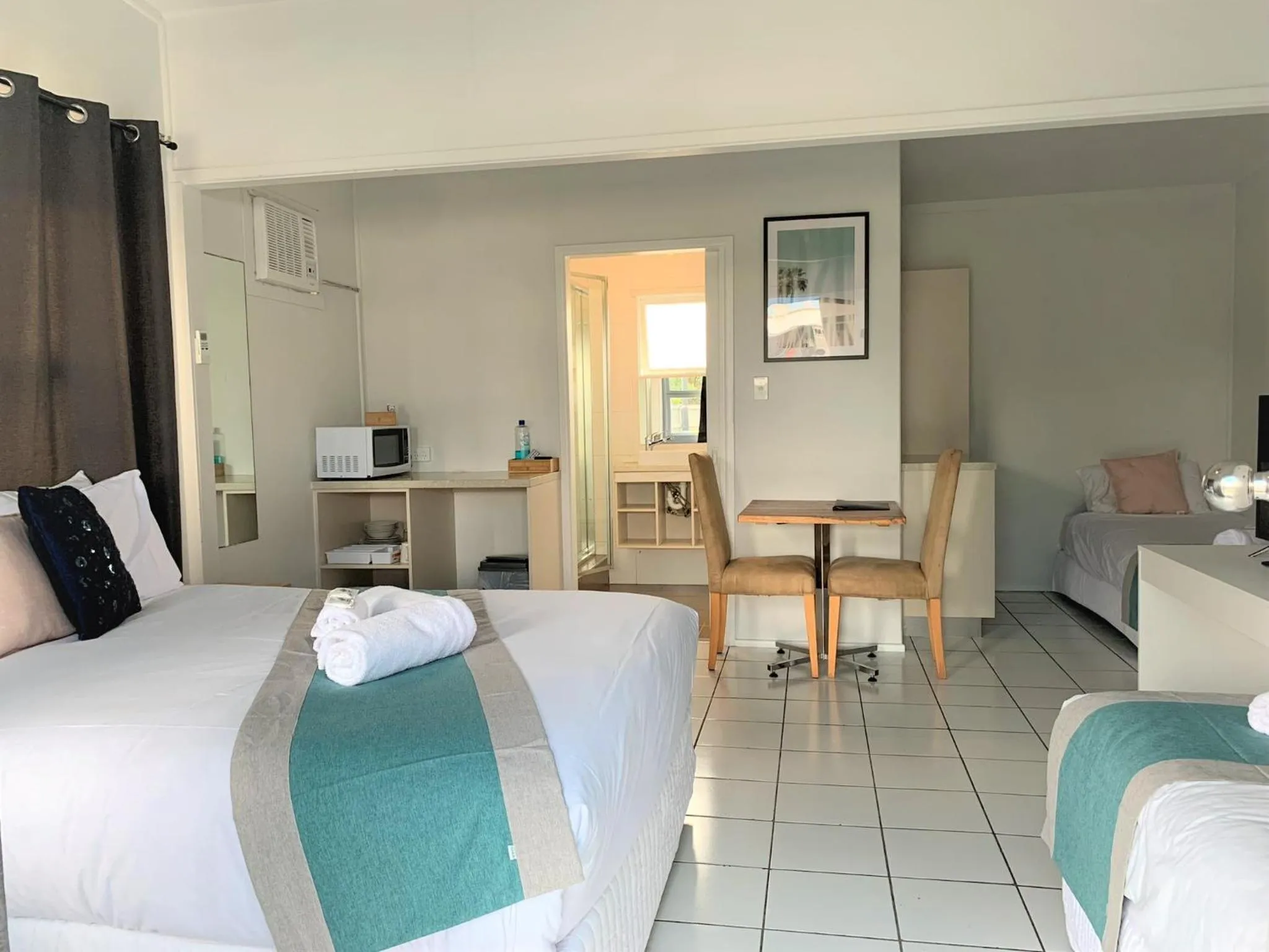 Bed in Aqua Blue Motel