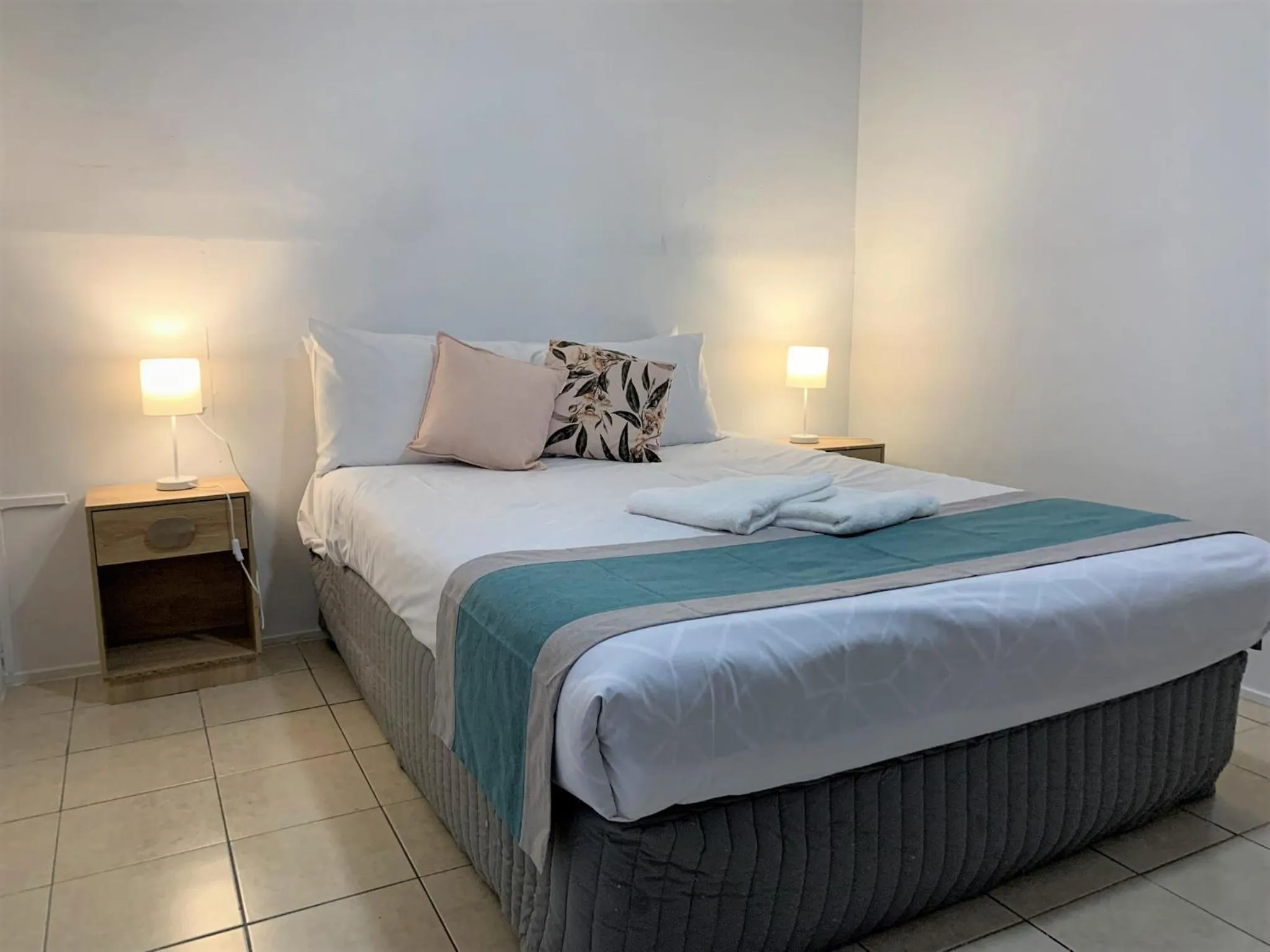 Bed in Aqua Blue Motel