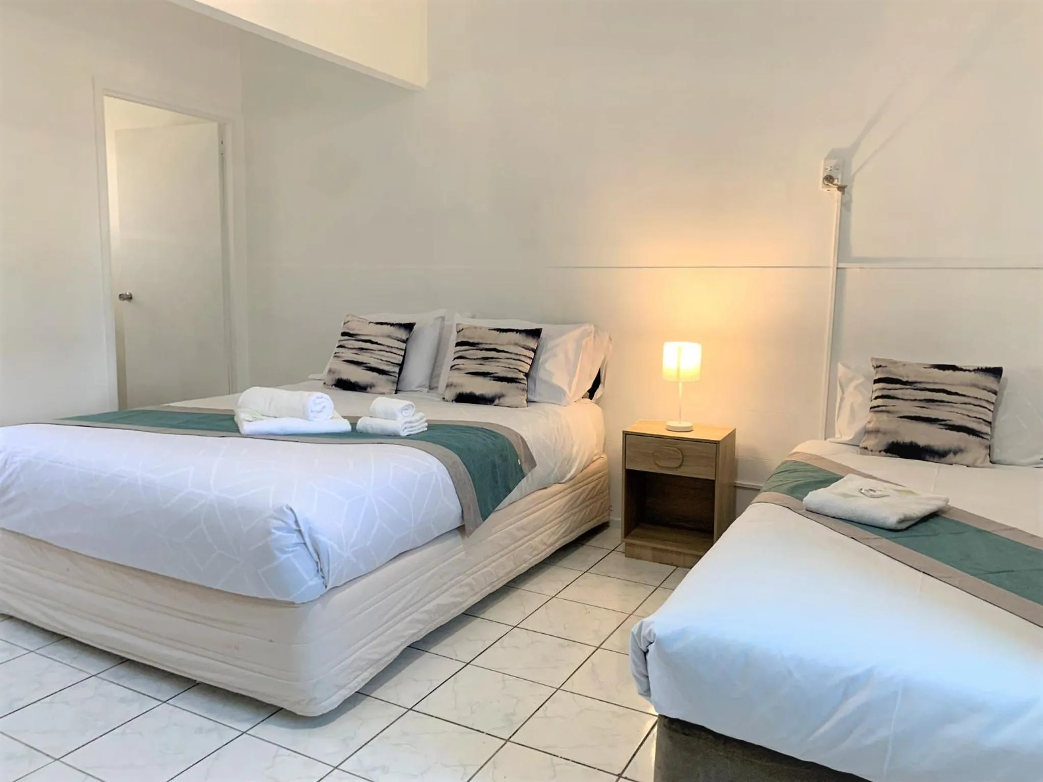 Bed in Aqua Blue Motel