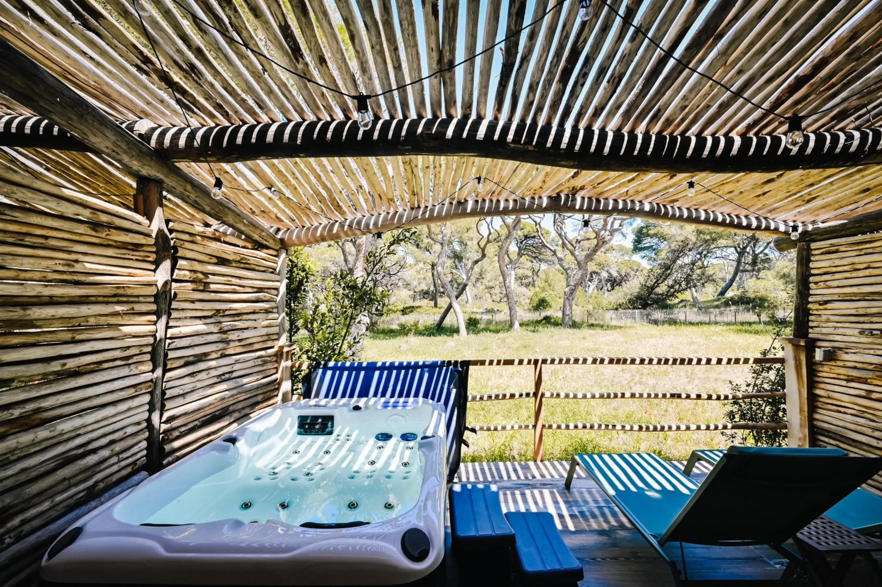 Patio in Le Hameau Des Pesquiers Ecolodge & Spa, Curio Collection By Hilton