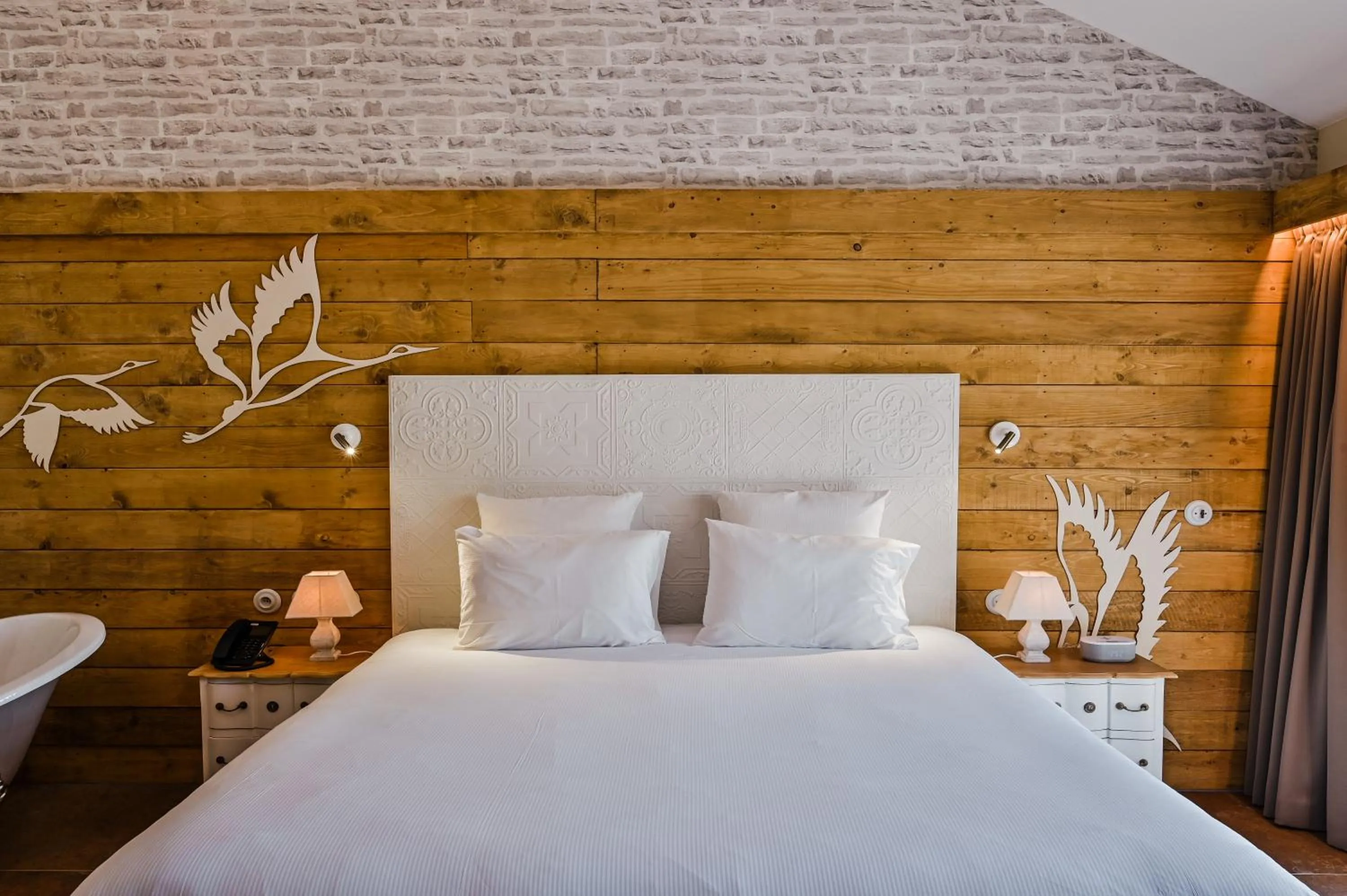 Bed in Le Hameau Des Pesquiers Ecolodge & Spa, Curio Collection By Hilton