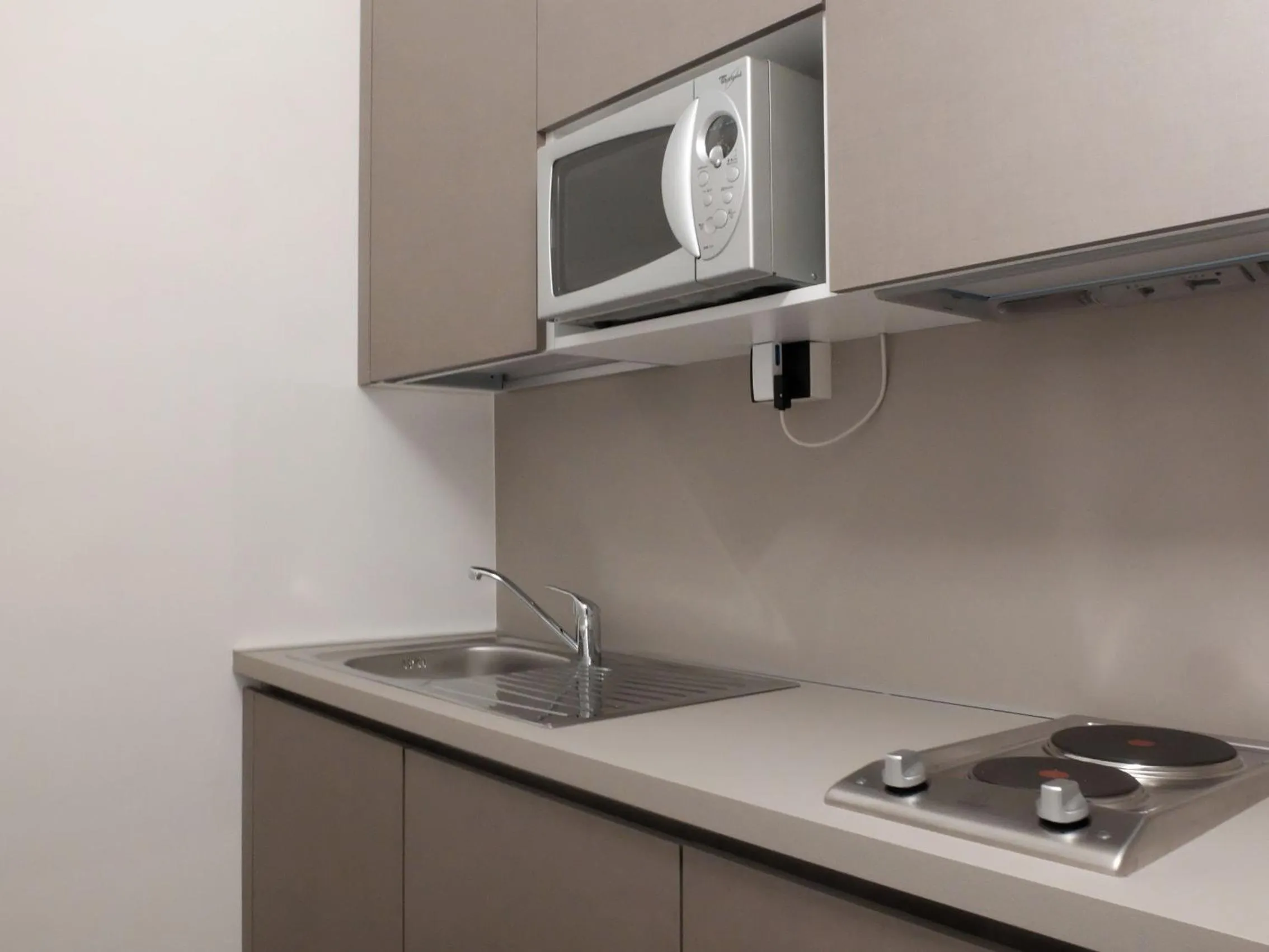 Kitchen or kitchenette in Hotel Carlton